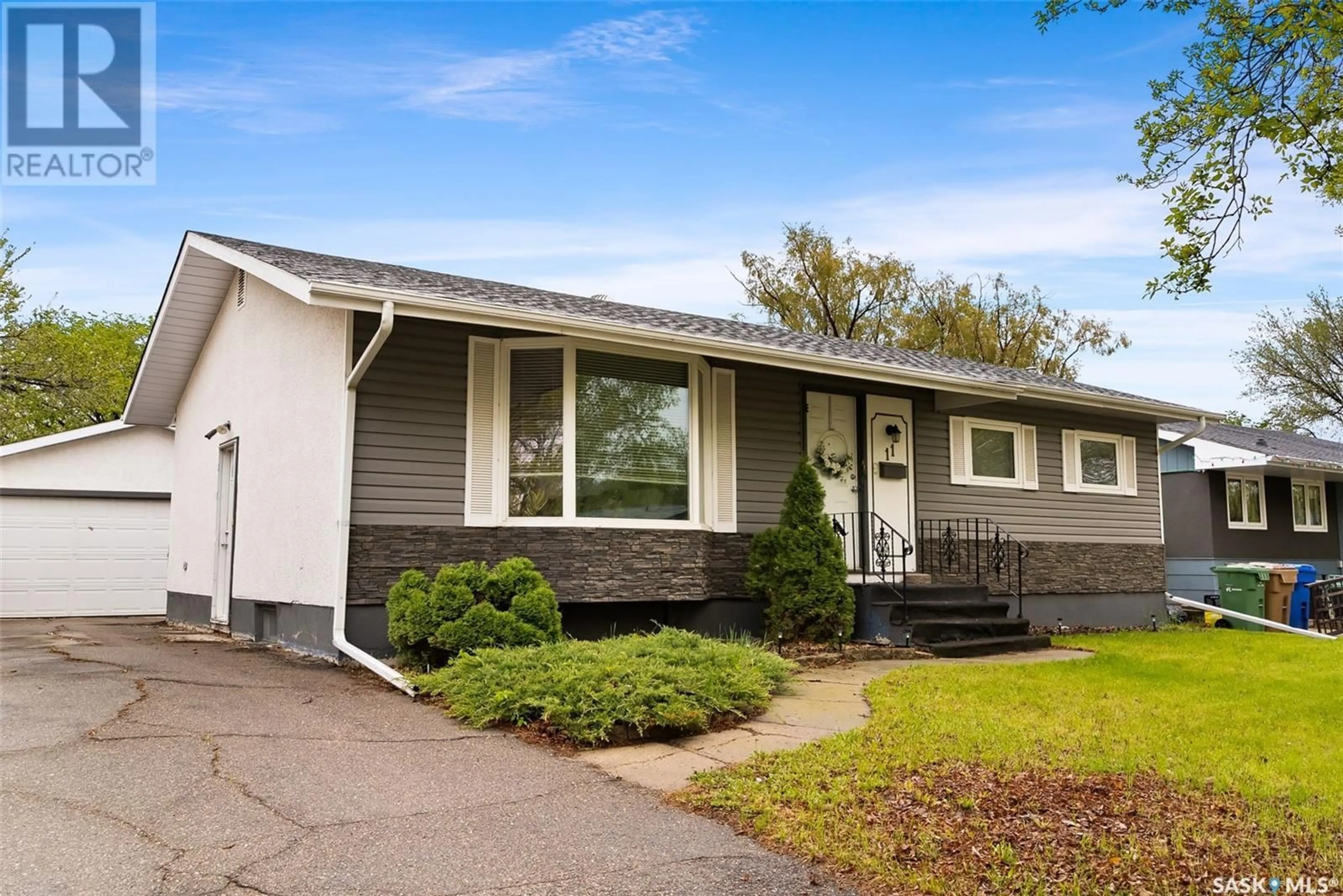 Home with vinyl exterior material, street for 11 KANGLES STREET, Regina Saskatchewan S4N4M9
