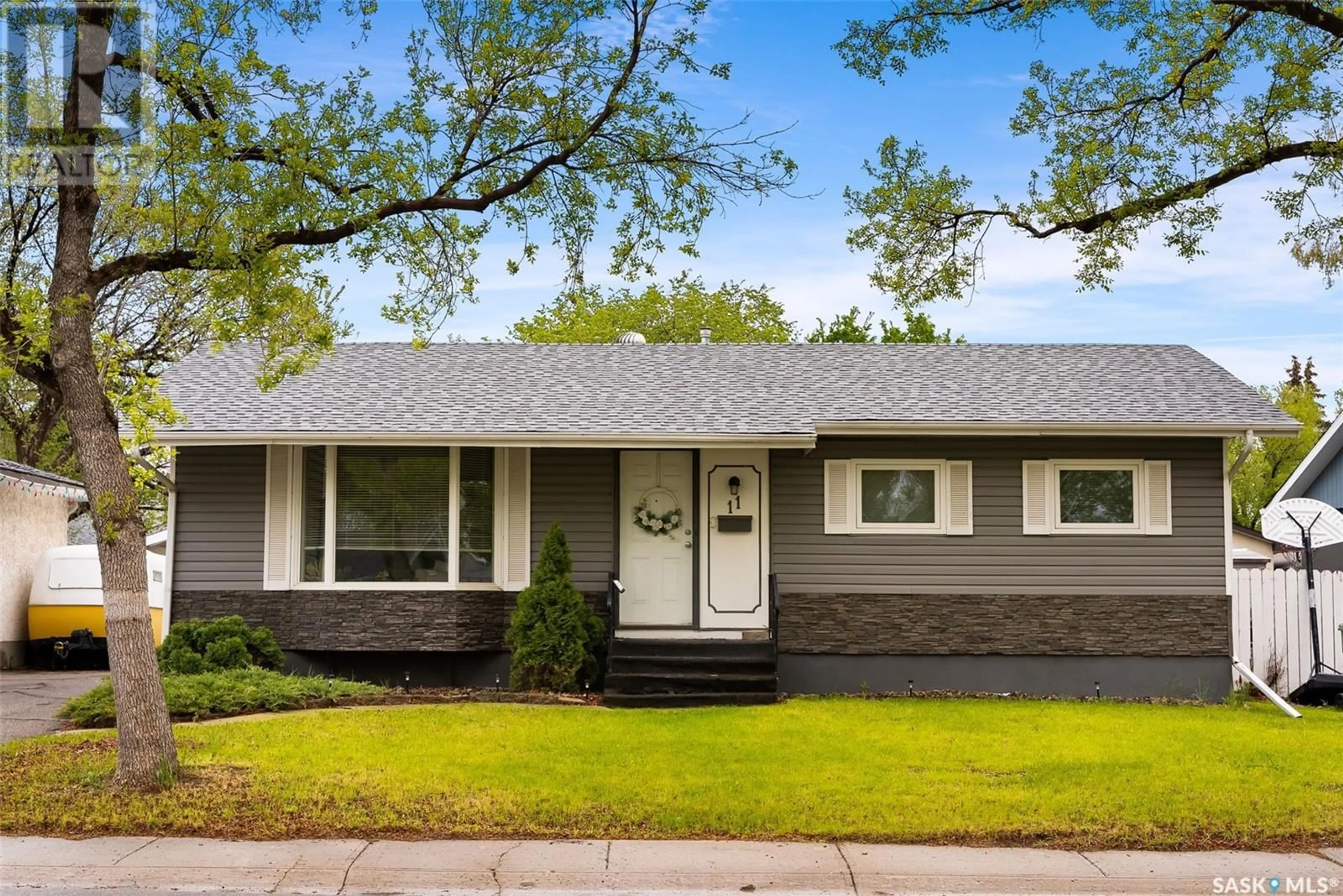 Home with vinyl exterior material, street for 11 KANGLES STREET, Regina Saskatchewan S4N4M9