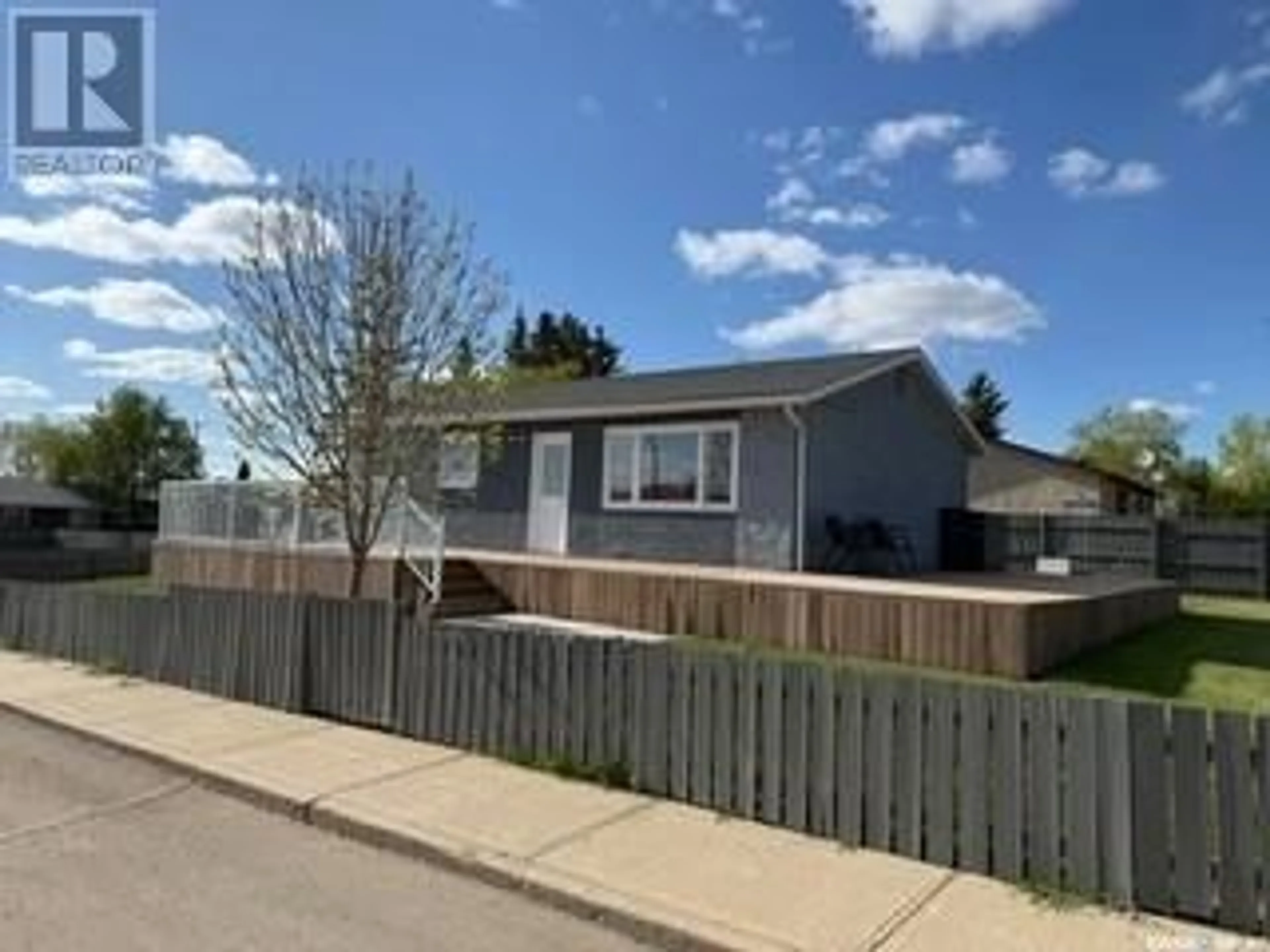 Home with vinyl exterior material, street for 1701 TRUDEAU STREET, North Battleford Saskatchewan S9A3B7