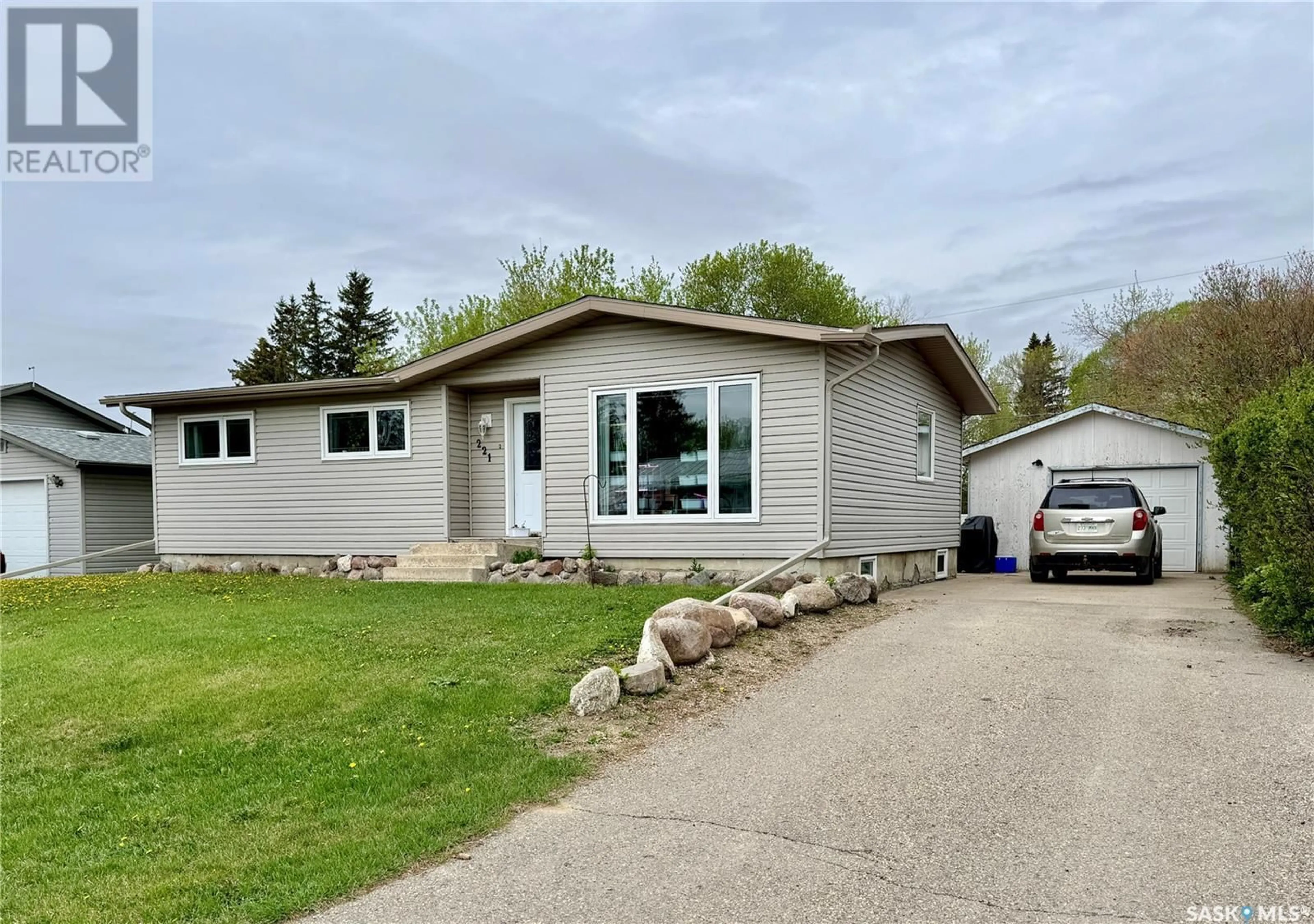 Home with vinyl exterior material, street for 221 FIFTH STREET, Bredenbury Saskatchewan S0A0H0