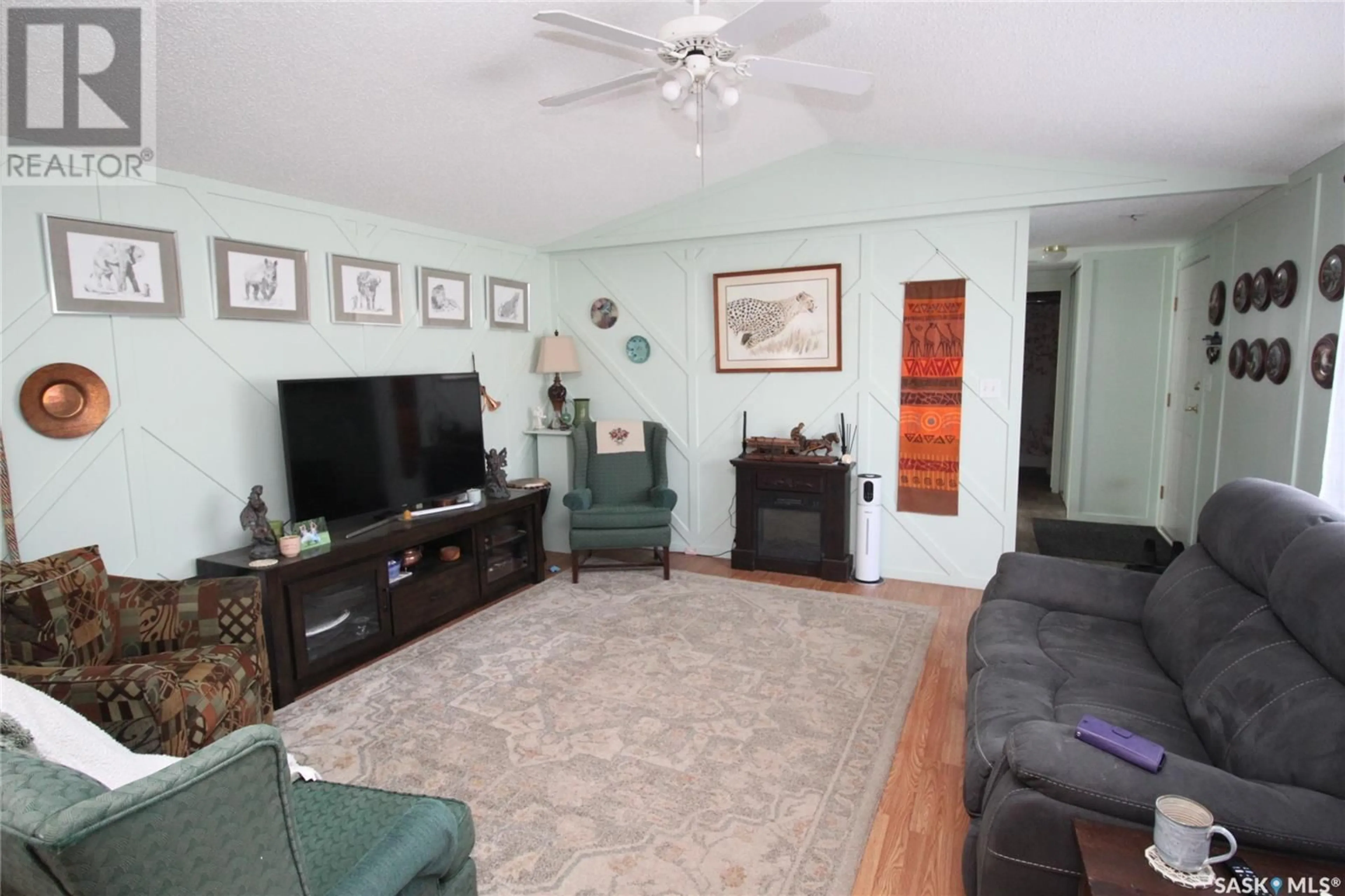 Living room with furniture, unknown for 83 MULBERRY ROAD, Sunset Estates Saskatchewan S7K3J9