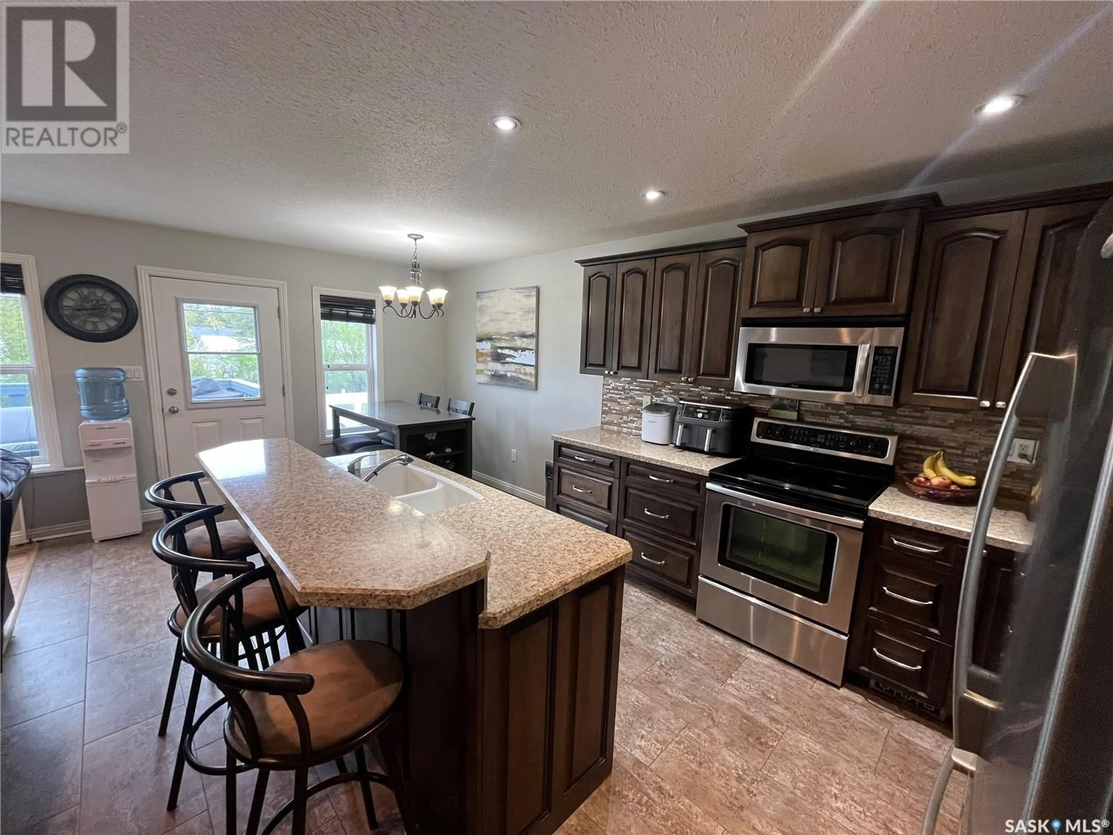 Open concept kitchen, ceramic/tile floor for 705 ST MARY STREET, Esterhazy Saskatchewan S0A0X0