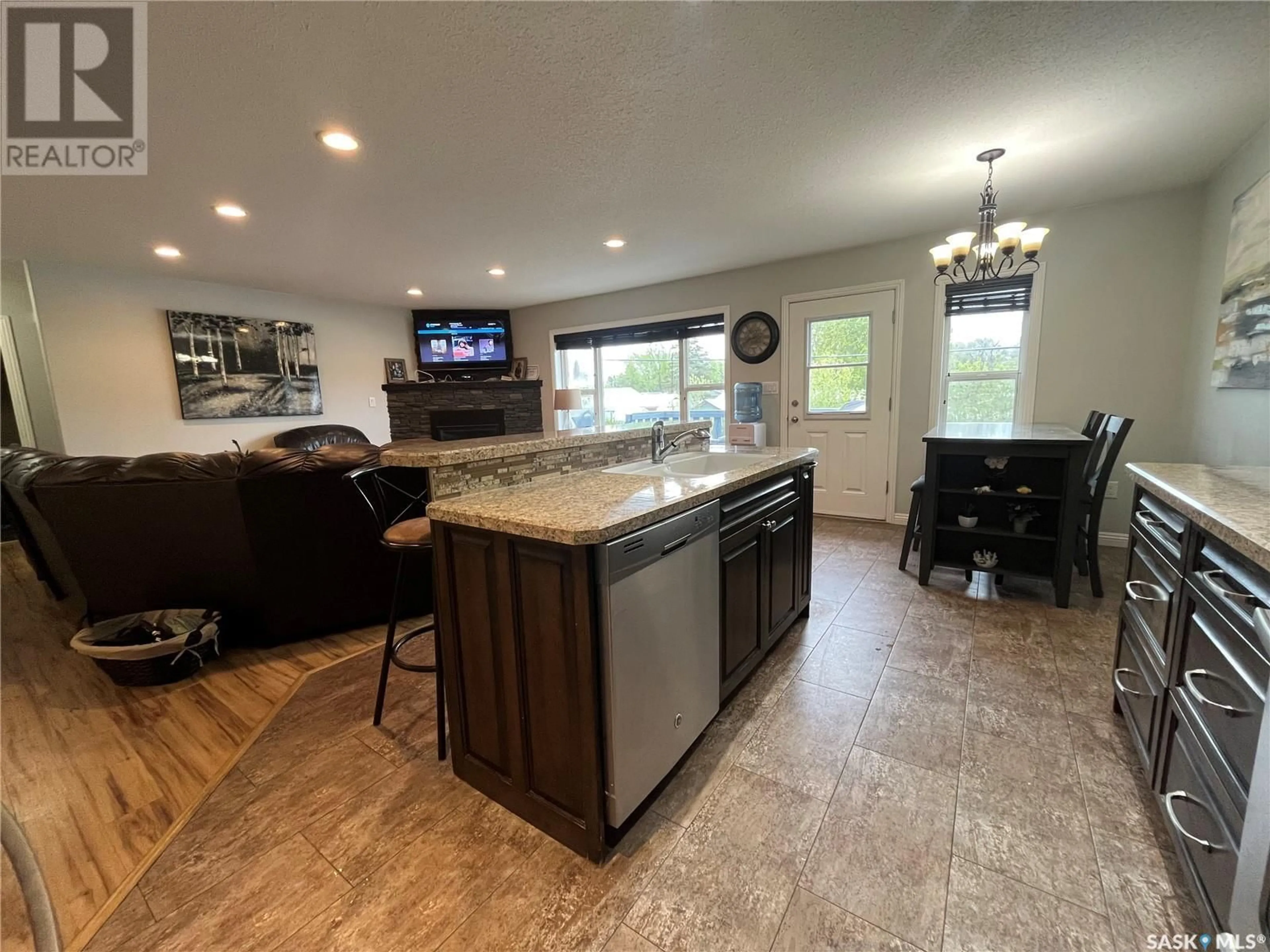 Open concept kitchen, ceramic/tile floor for 705 ST MARY STREET, Esterhazy Saskatchewan S0A0X0