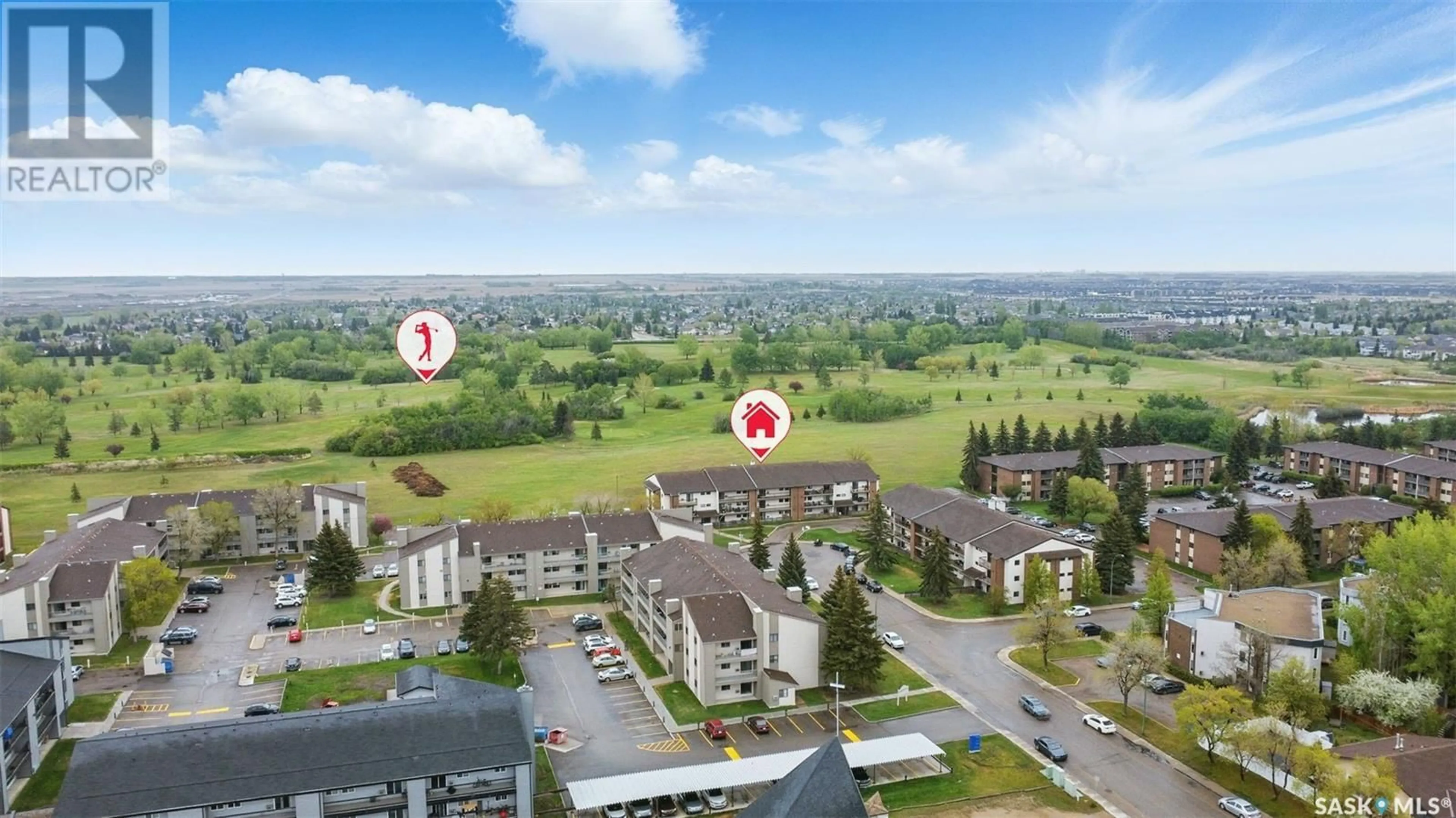 A pic from outside/outdoor area/front of a property/back of a property/a pic from drone, mountain view for 102 211 TAIT PLACE, Saskatoon Saskatchewan S7H5L5