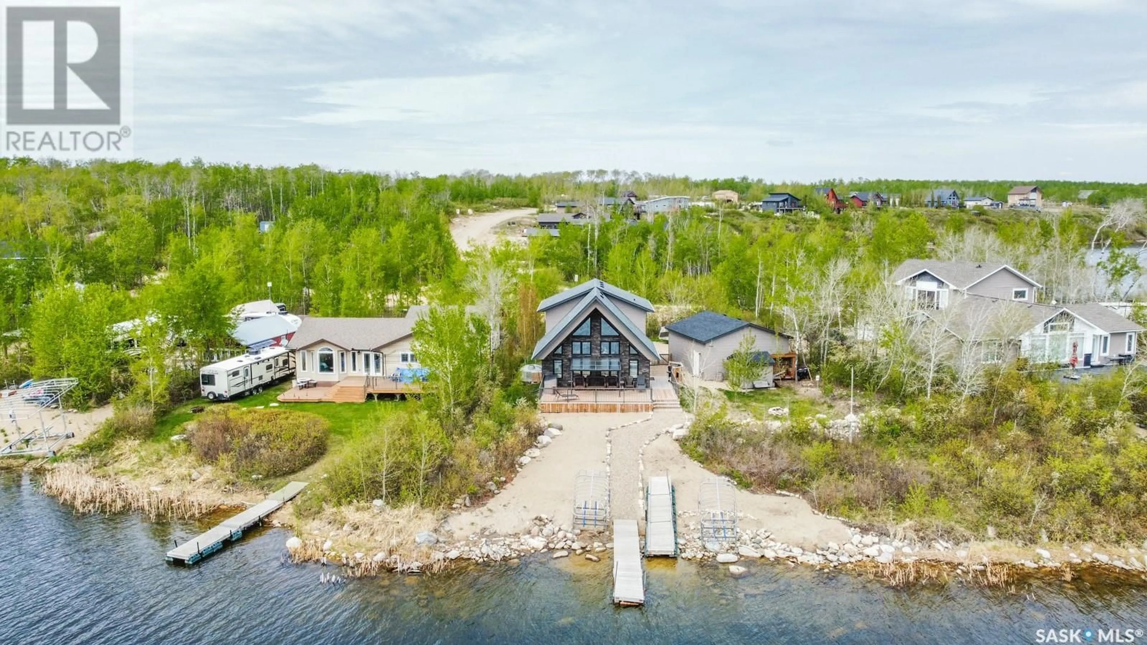 A pic from outside/outdoor area/front of a property/back of a property/a pic from drone, water/lake/river/ocean view for 662 WILLOW POINT WAY, Lake Lenore Rm No. 399 Saskatchewan S0K3V0