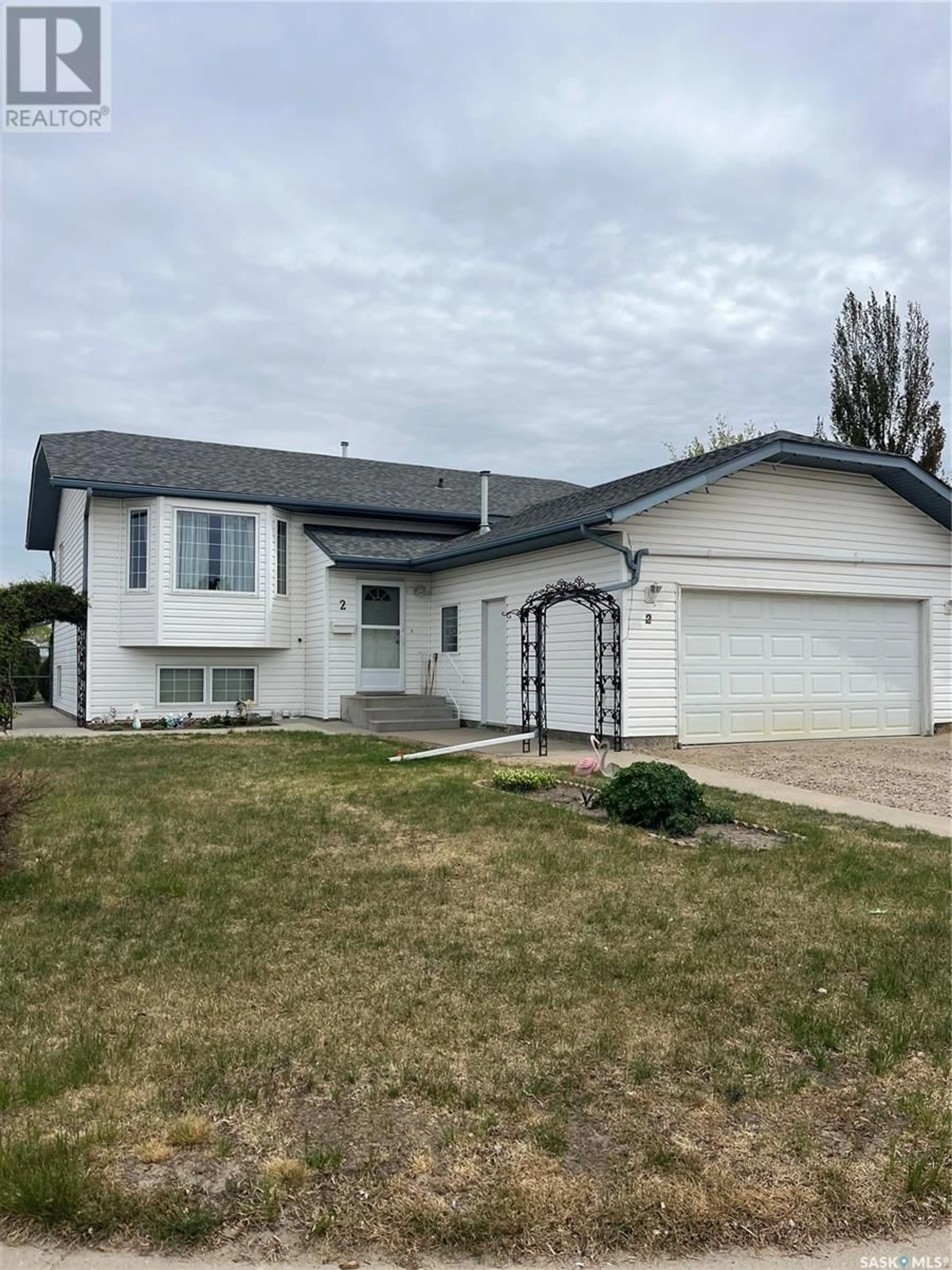 Home with vinyl exterior material, street for 2 MOONEY PLACE, Prince Albert Saskatchewan S6V8C4