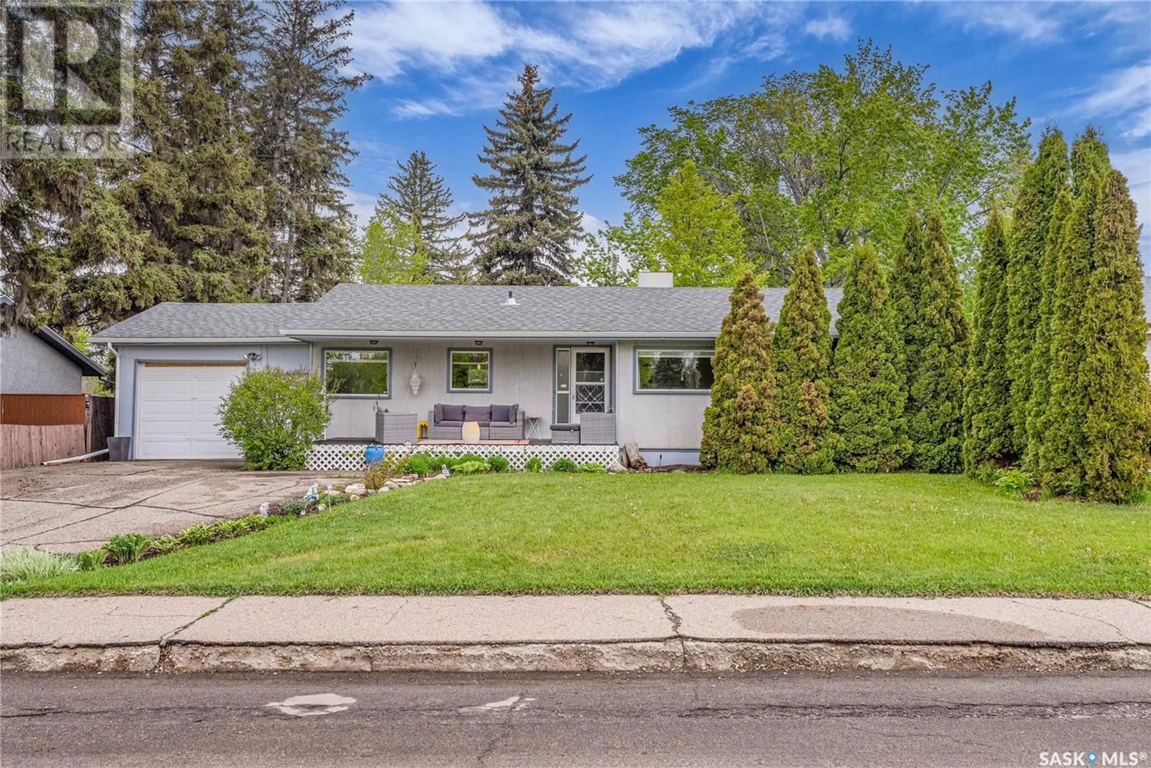 Home with vinyl exterior material, street for 505 HILLIARD STREET, Saskatoon Saskatchewan S7J0E9