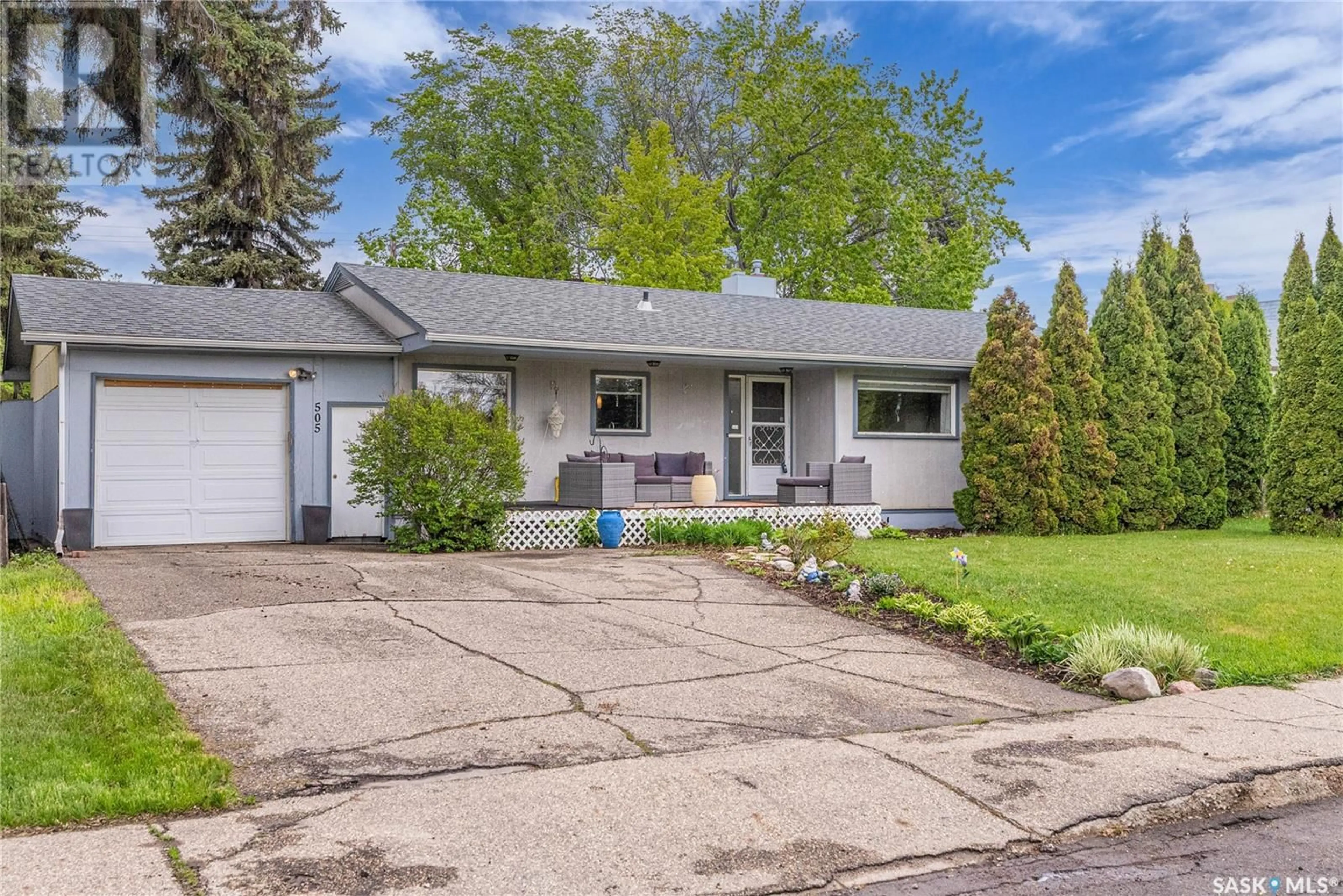 Home with vinyl exterior material, street for 505 HILLIARD STREET, Saskatoon Saskatchewan S7J0E9