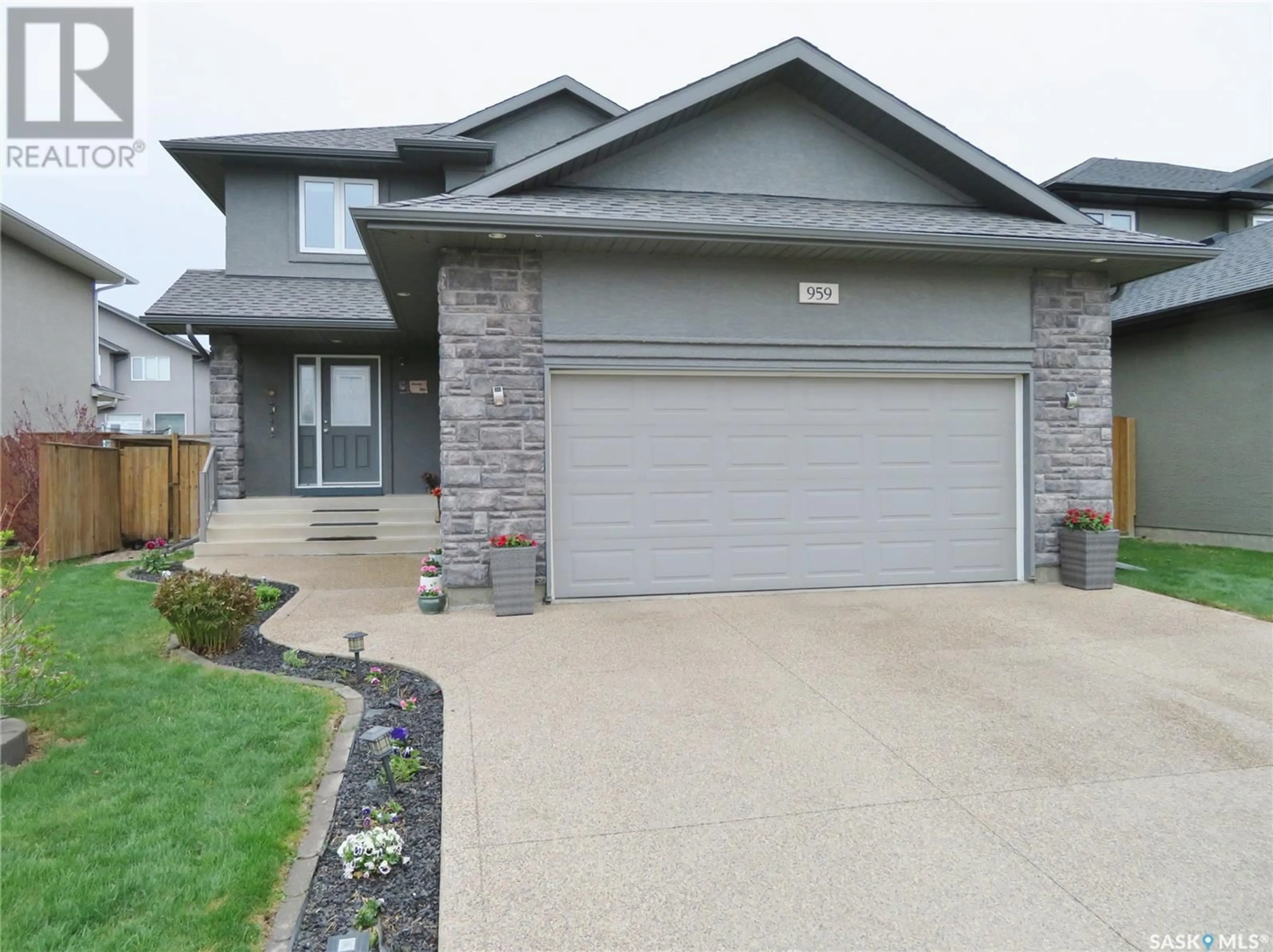 Home with brick exterior material, street for 959 HUNTER ROAD, Saskatoon Saskatchewan S7T0P9