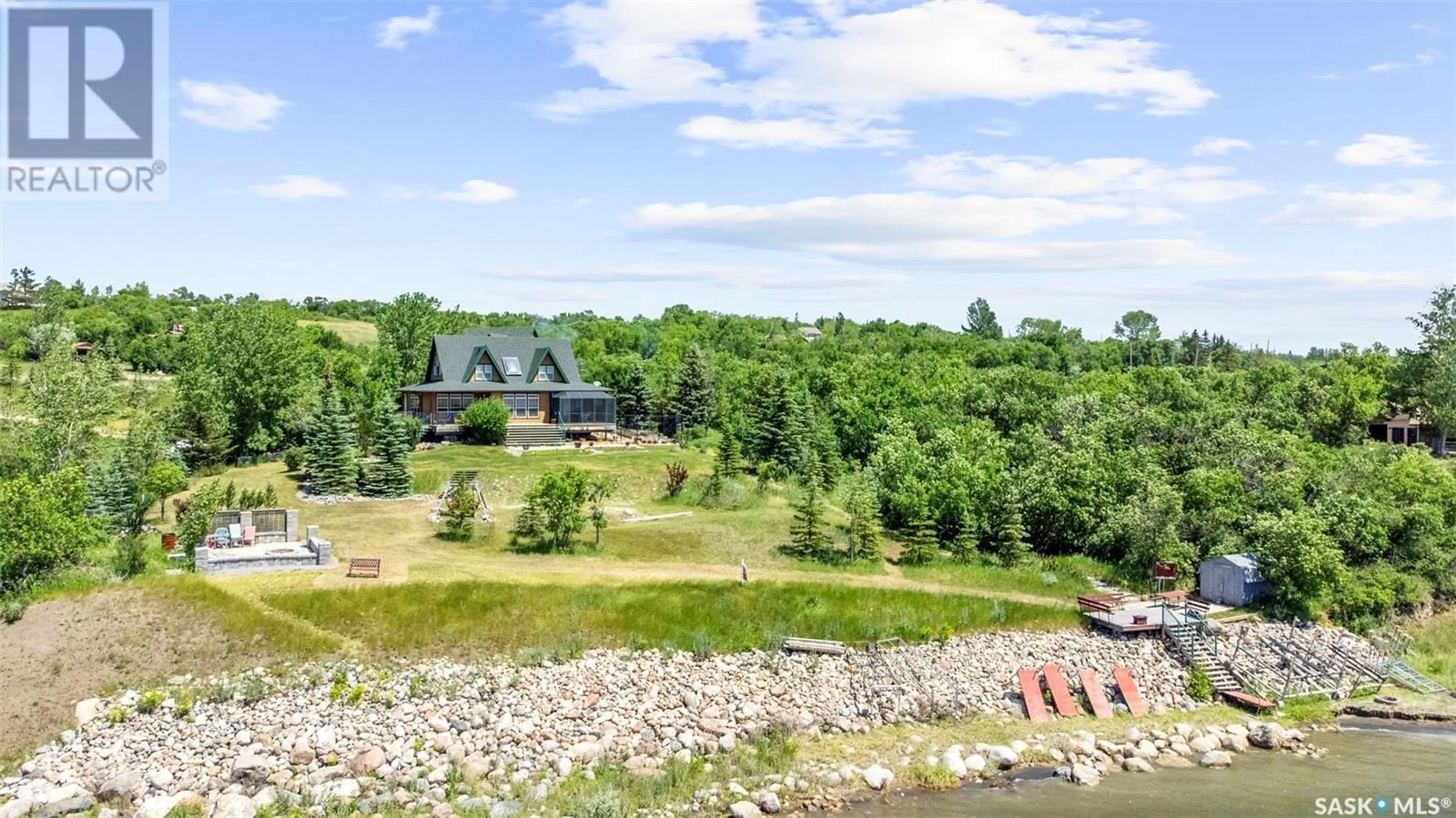 A pic from outside/outdoor area/front of a property/back of a property/a pic from drone, water/lake/river/ocean view for 12 WATSON BAY, Mckillop Rm No. 220 Saskatchewan S0G0L0