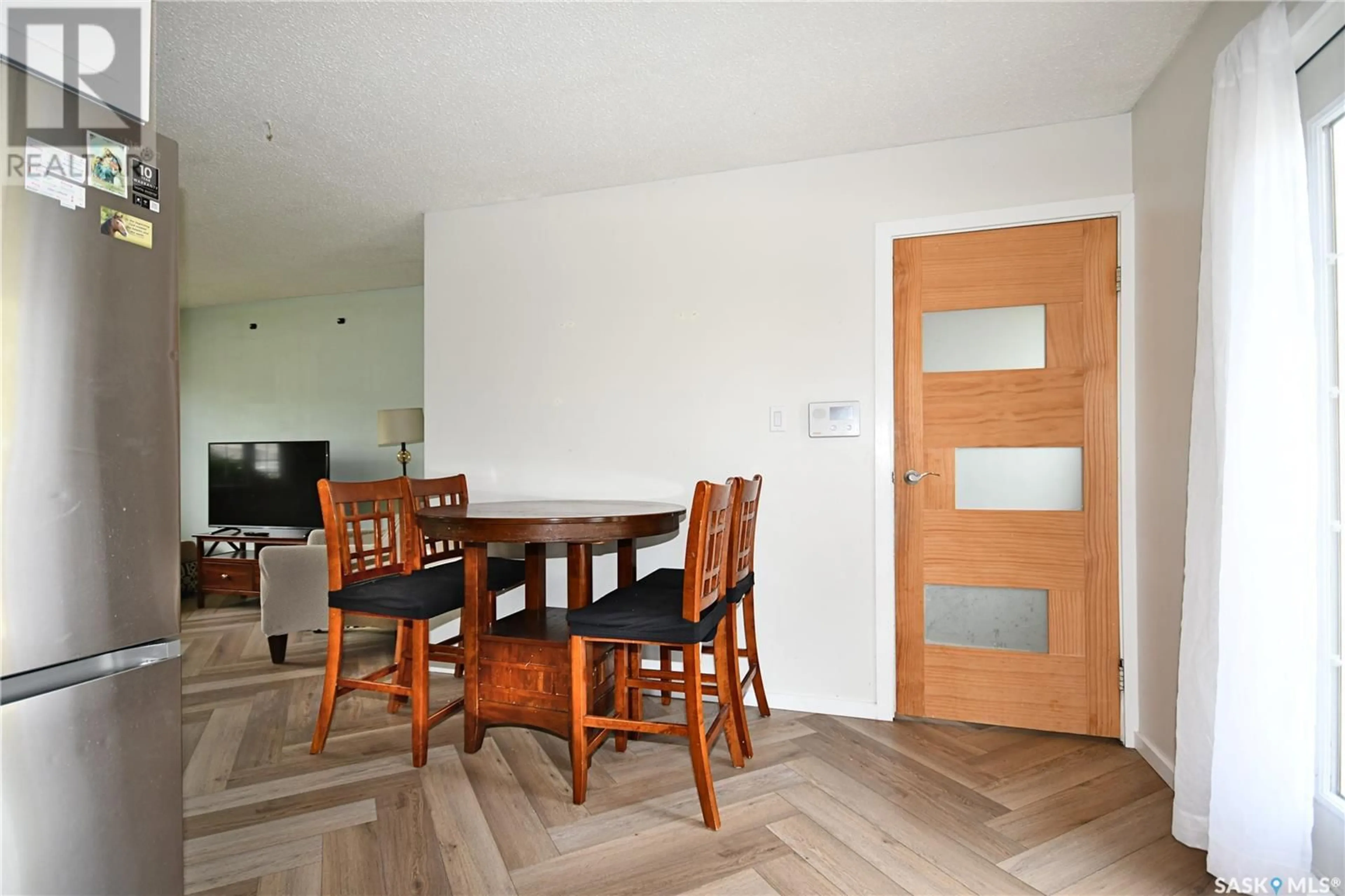 Dining room, wood/laminate floor for 161 MACDOWALL CRESCENT, Prince Albert Saskatchewan S6V6N4