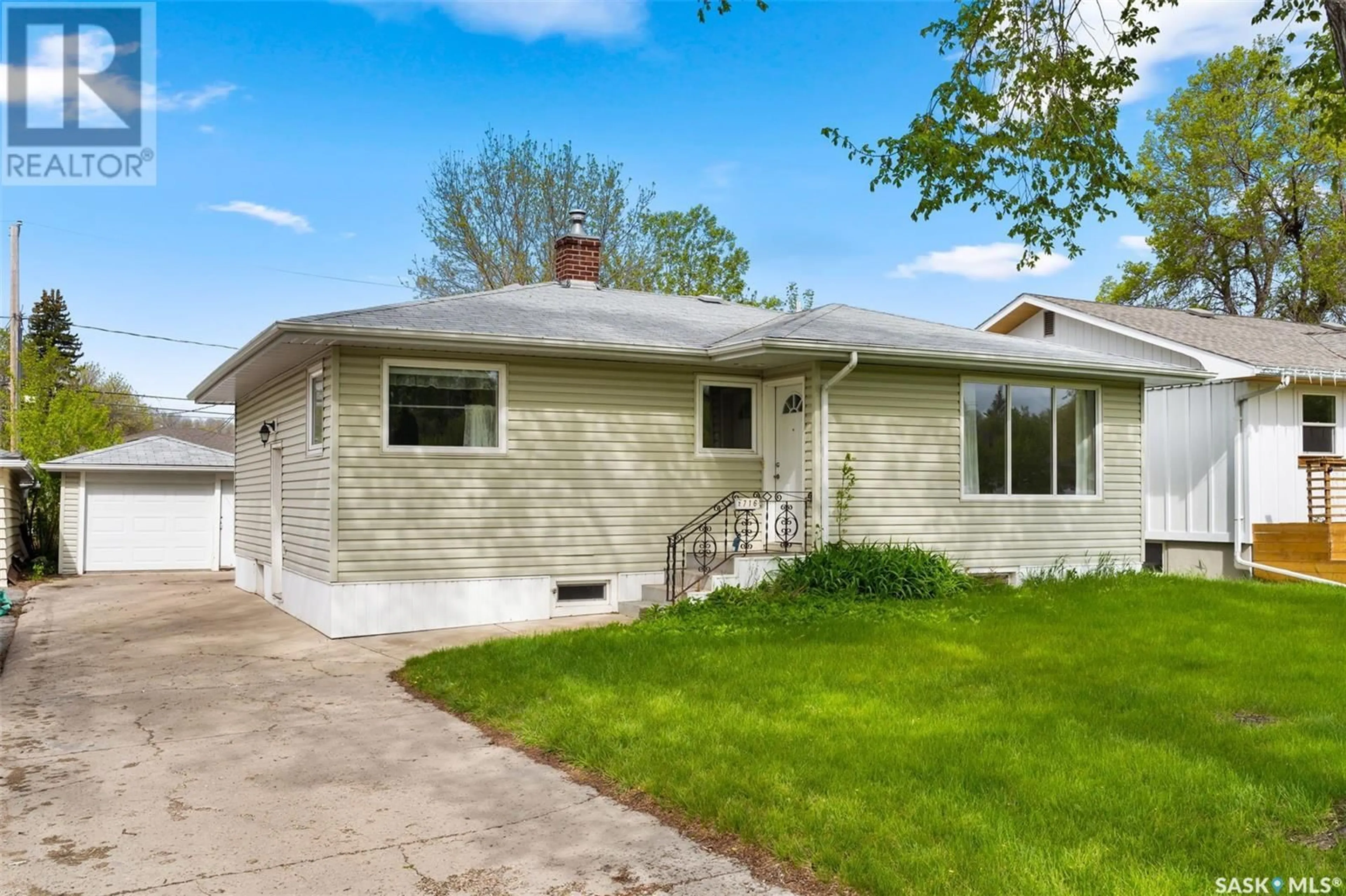 Home with vinyl exterior material, street for 2716 WINNIPEG STREET, Regina Saskatchewan S4P1H9