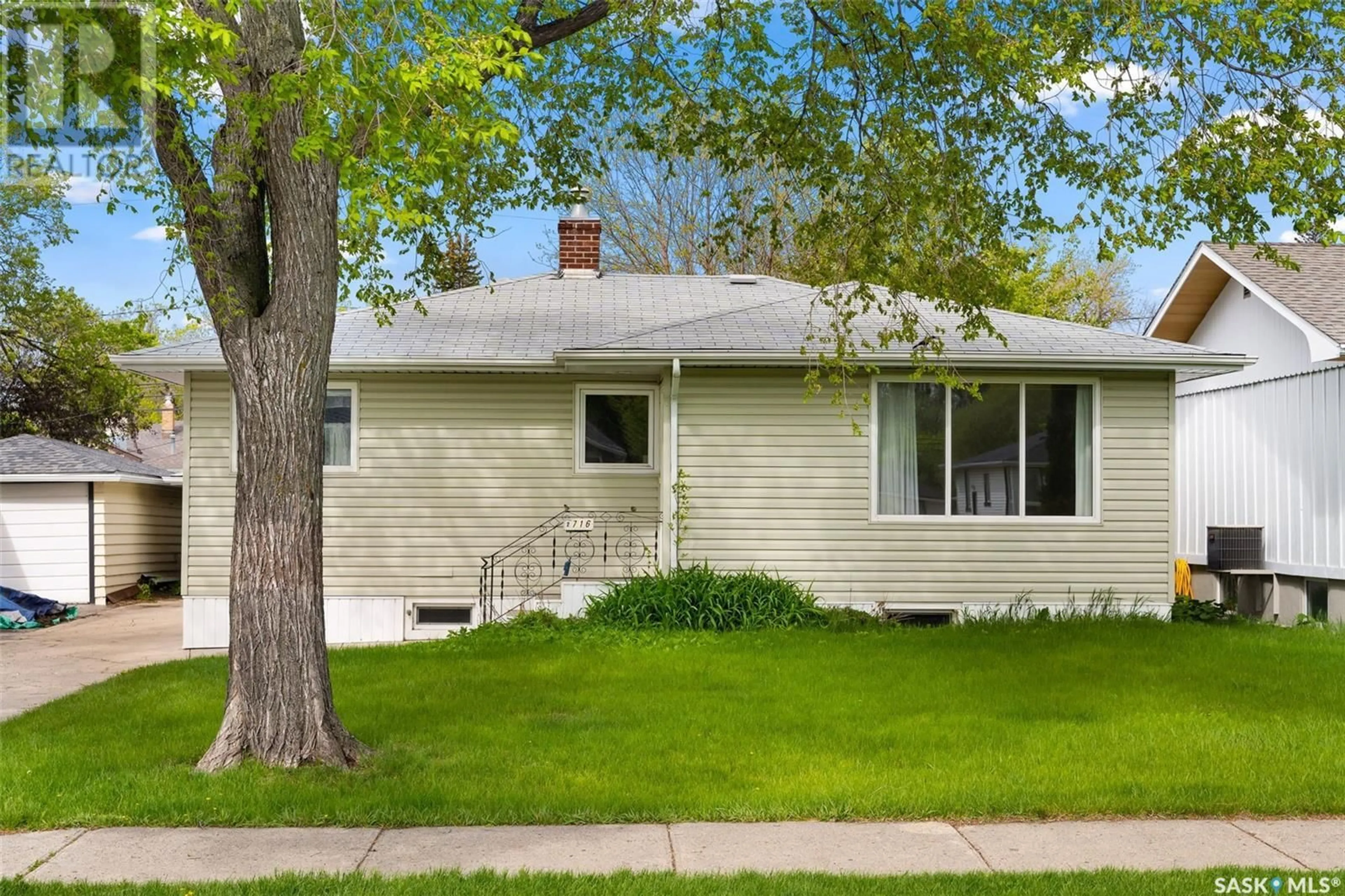 Home with vinyl exterior material, street for 2716 WINNIPEG STREET, Regina Saskatchewan S4P1H9