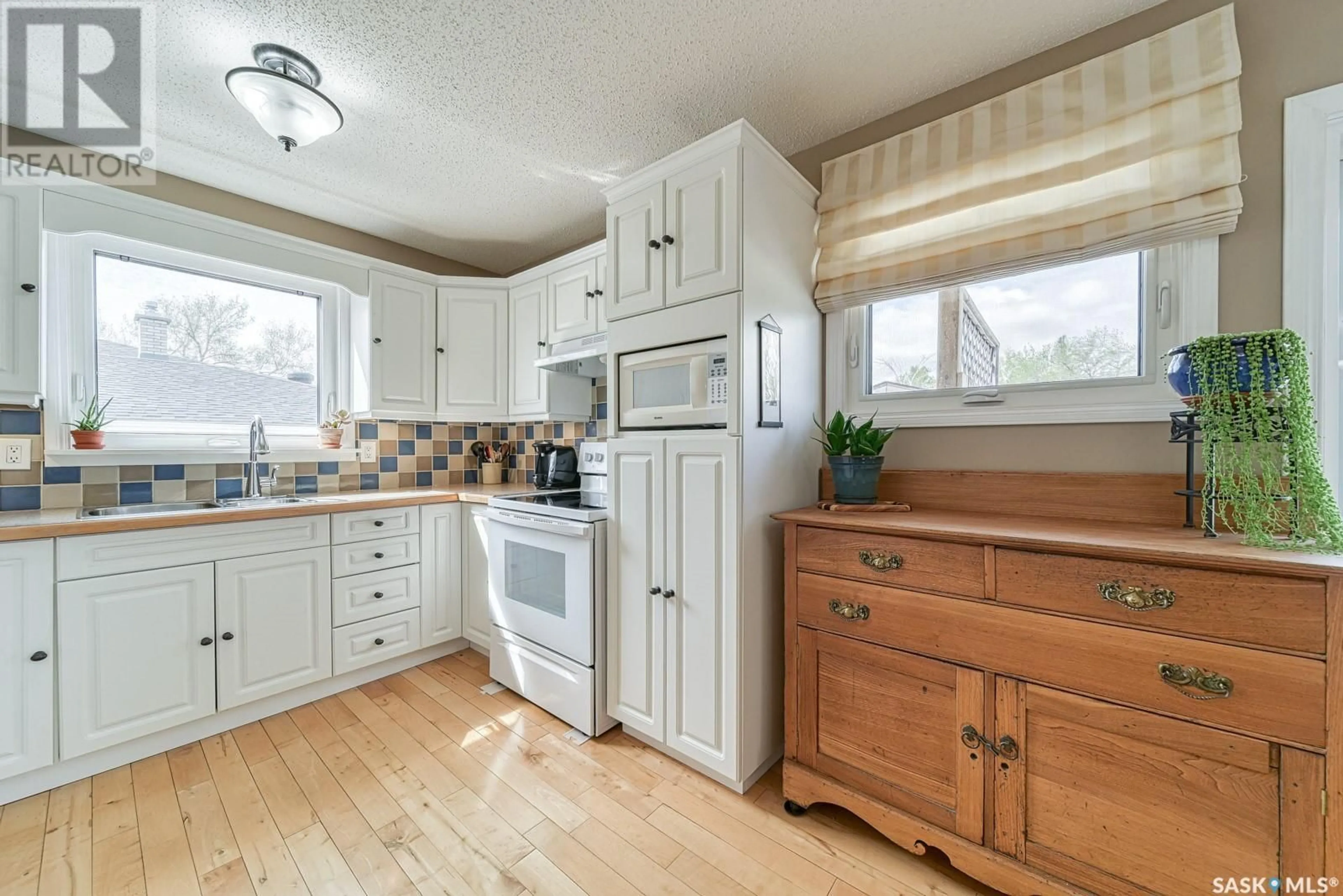 Open concept kitchen, unknown for 12 BAUERMEISTER STREET, Regina Saskatchewan S4R5N4