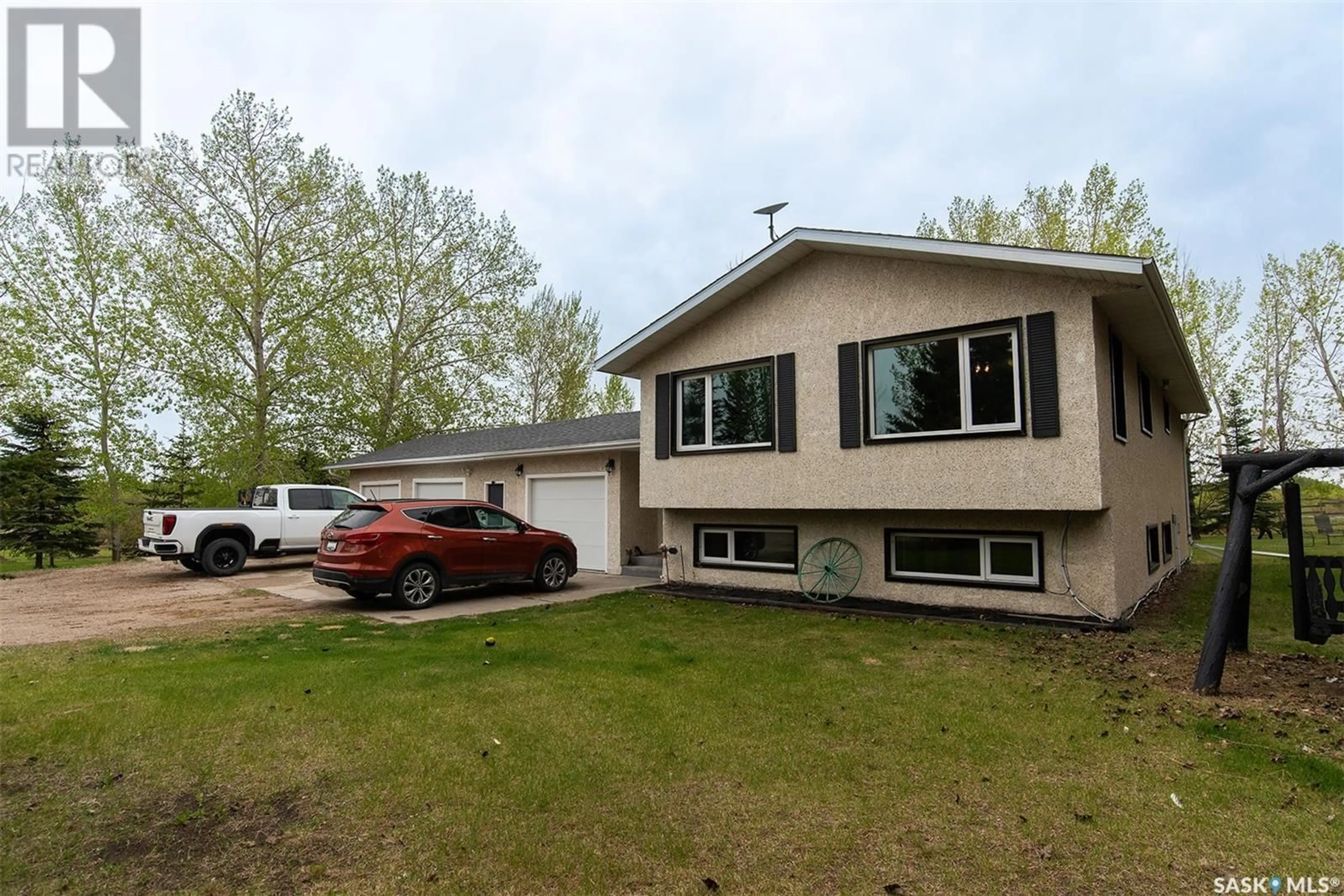 Home with vinyl exterior material, street for FORBES ACREAGE, Wynyard Saskatchewan S0A4T0