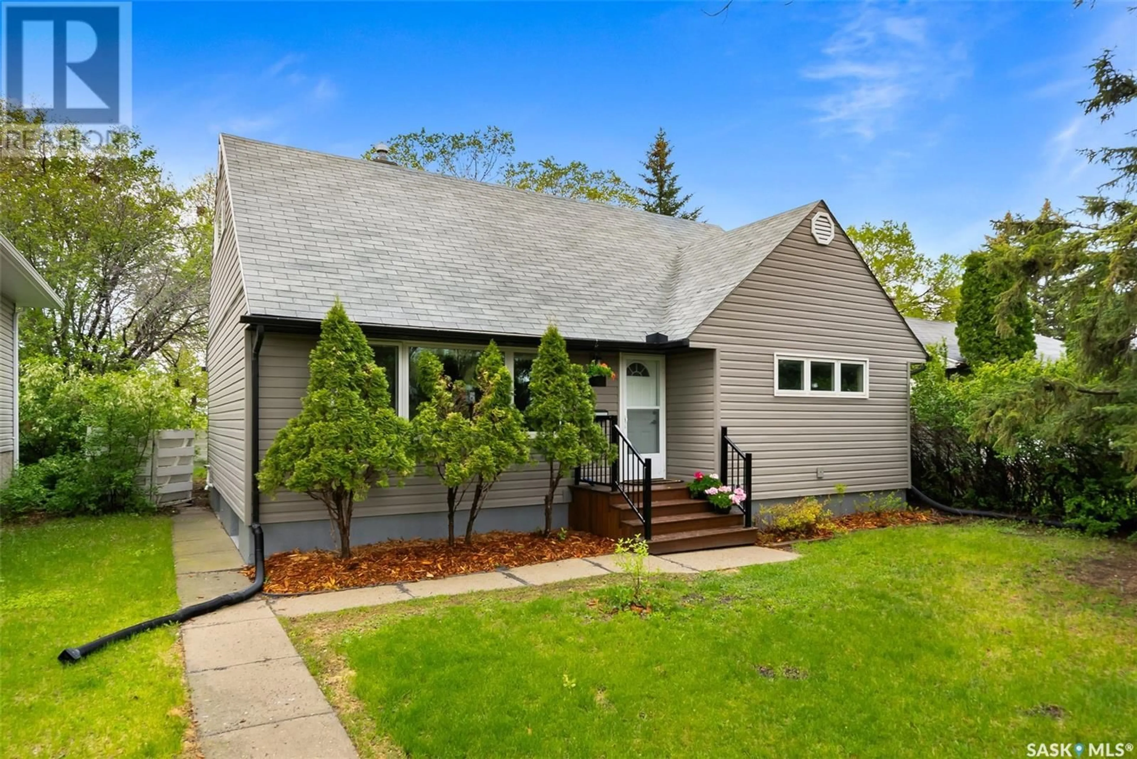 Home with vinyl exterior material, street for 2526 EDWARD STREET, Regina Saskatchewan S4S0M8