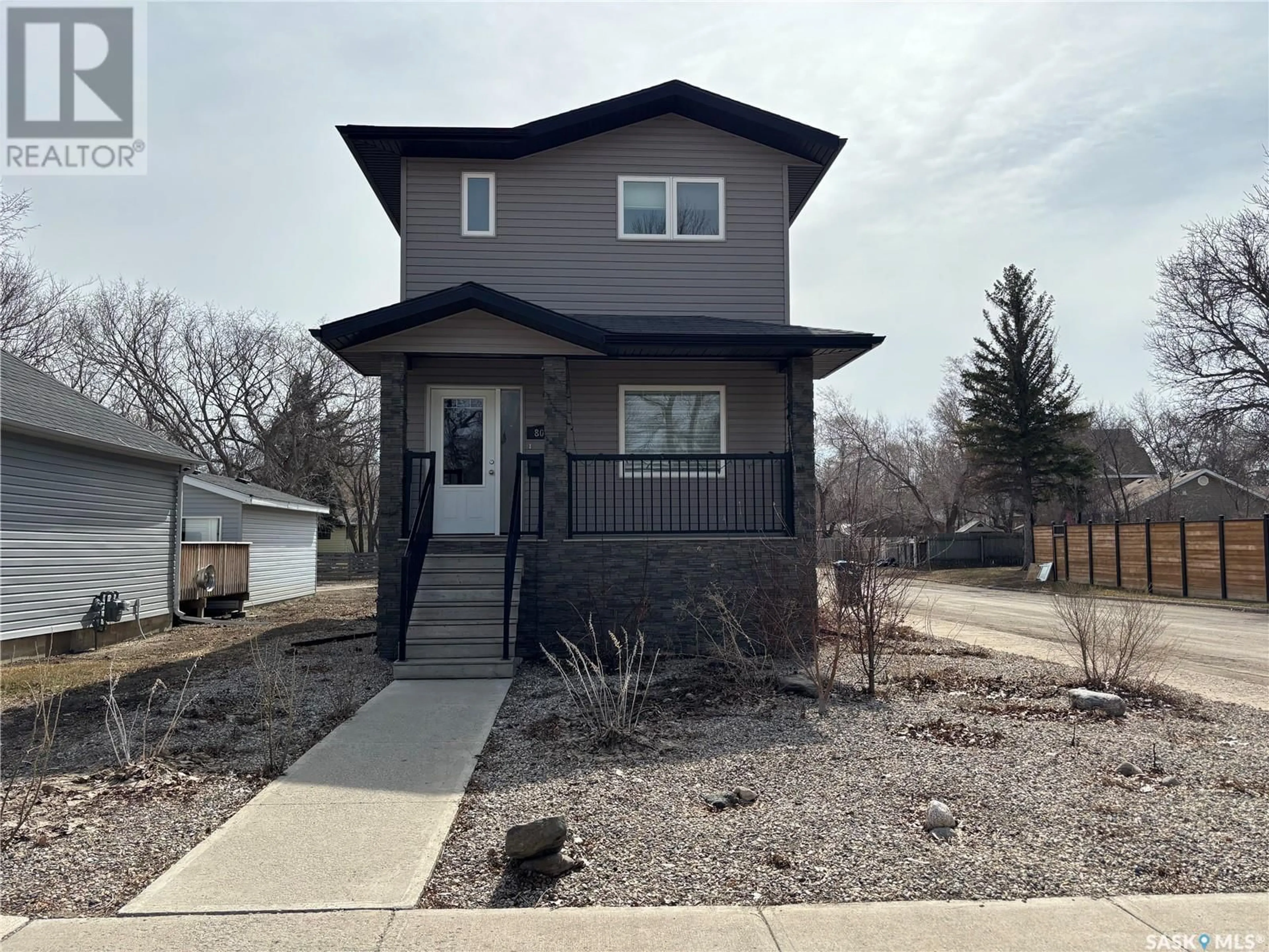 Home with vinyl exterior material, street for 802 PARK AVENUE, Weyburn Saskatchewan S4H0K2