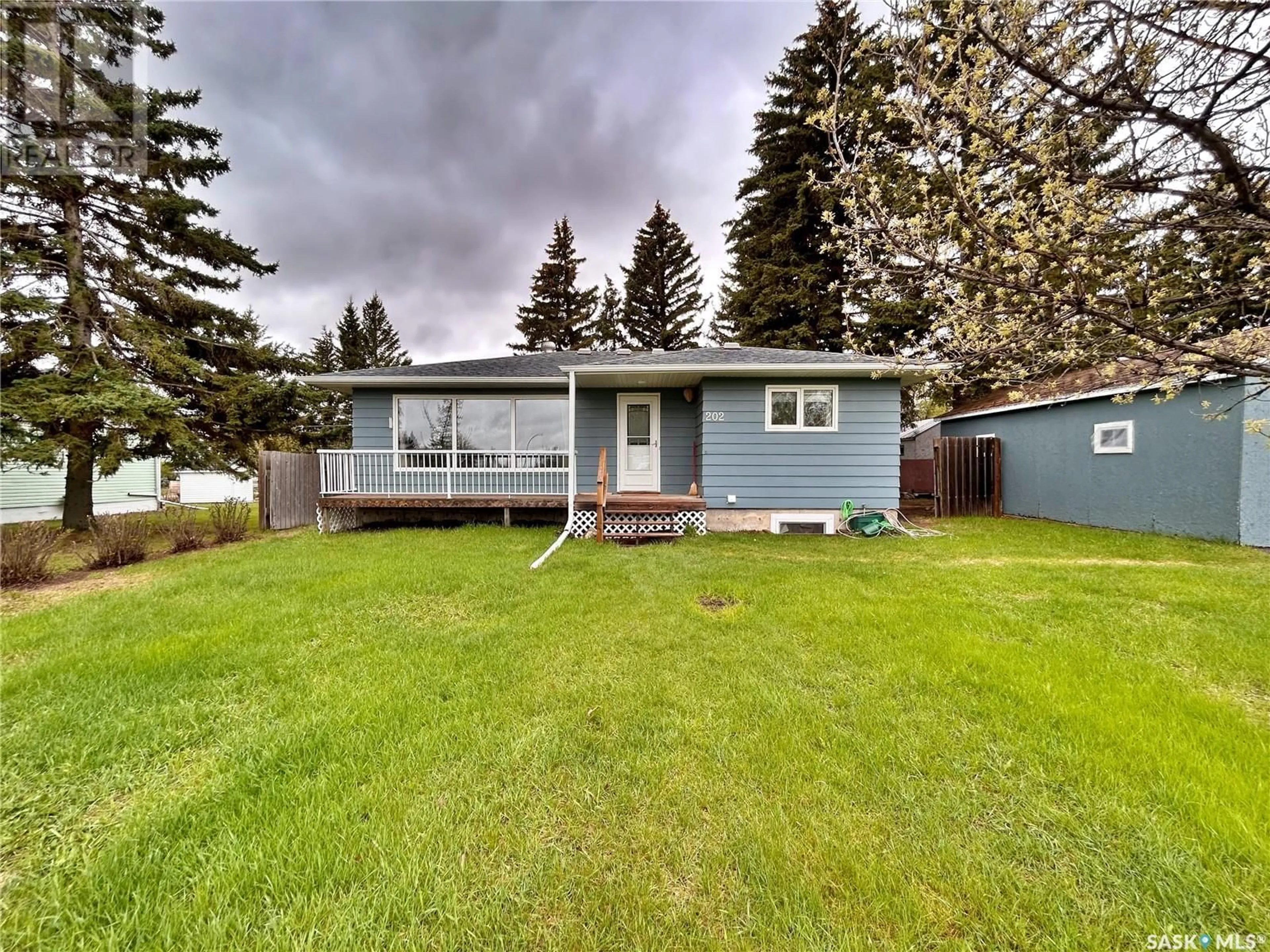 Home with vinyl exterior material, street for 202 WILFRED STREET, Wawota Saskatchewan S0G5A0