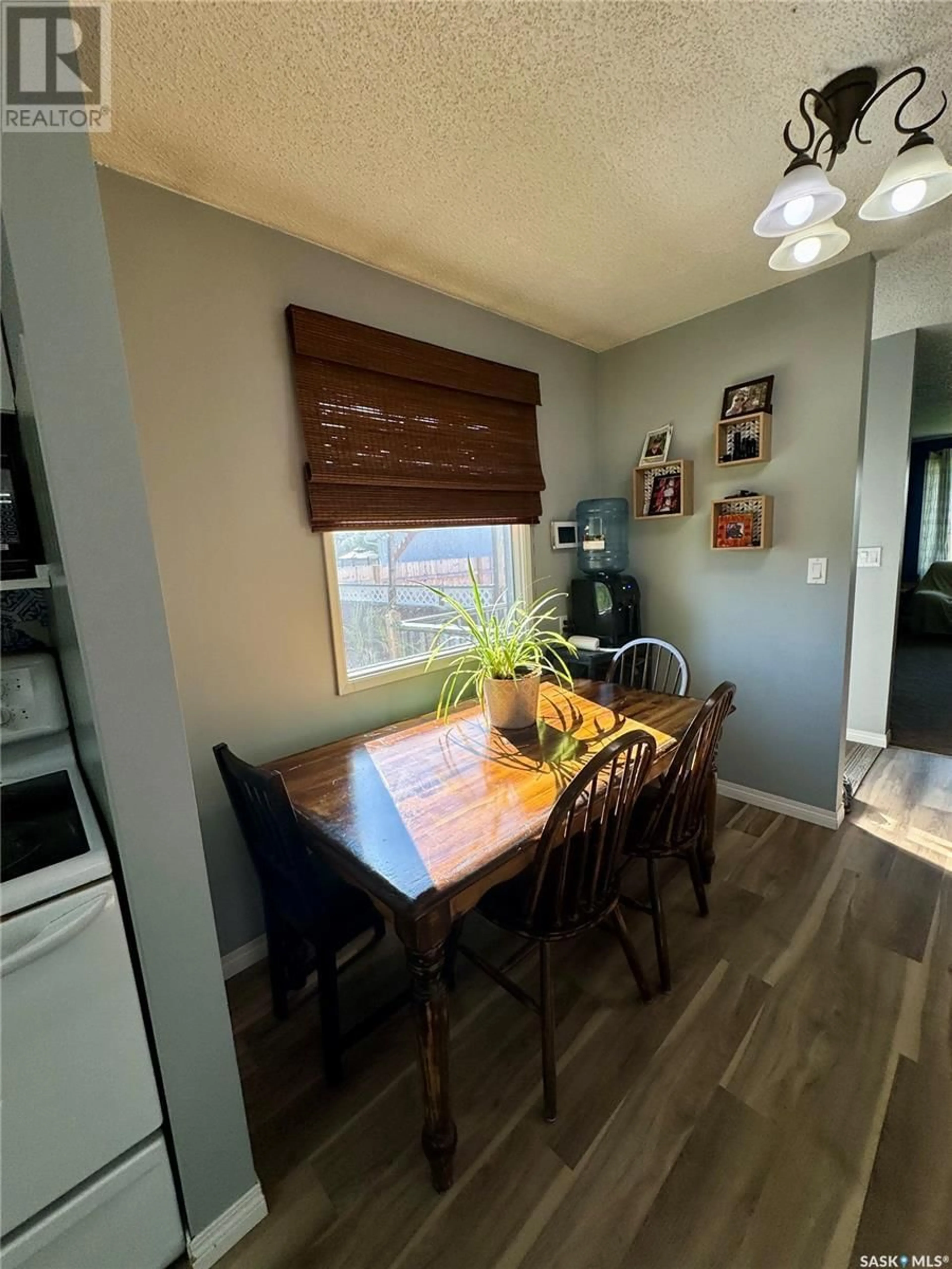 Dining room, wood/laminate floor for 713 BIRCH CRESCENT, Hudson Bay Saskatchewan S0E0Y0