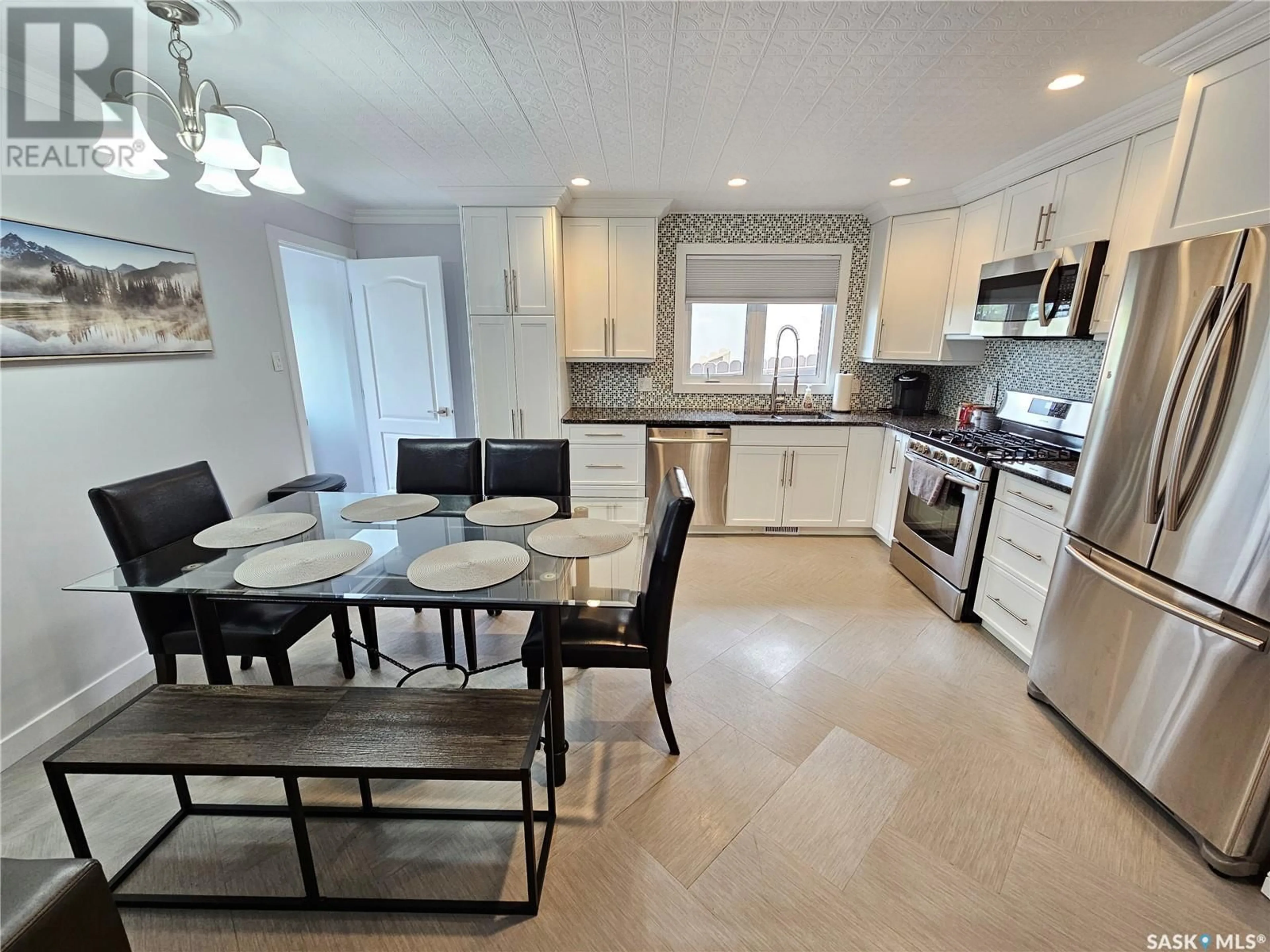 Open concept kitchen, ceramic/tile floor for 1010 HOCHELAGA STREET, Moose Jaw Saskatchewan S6H2H9