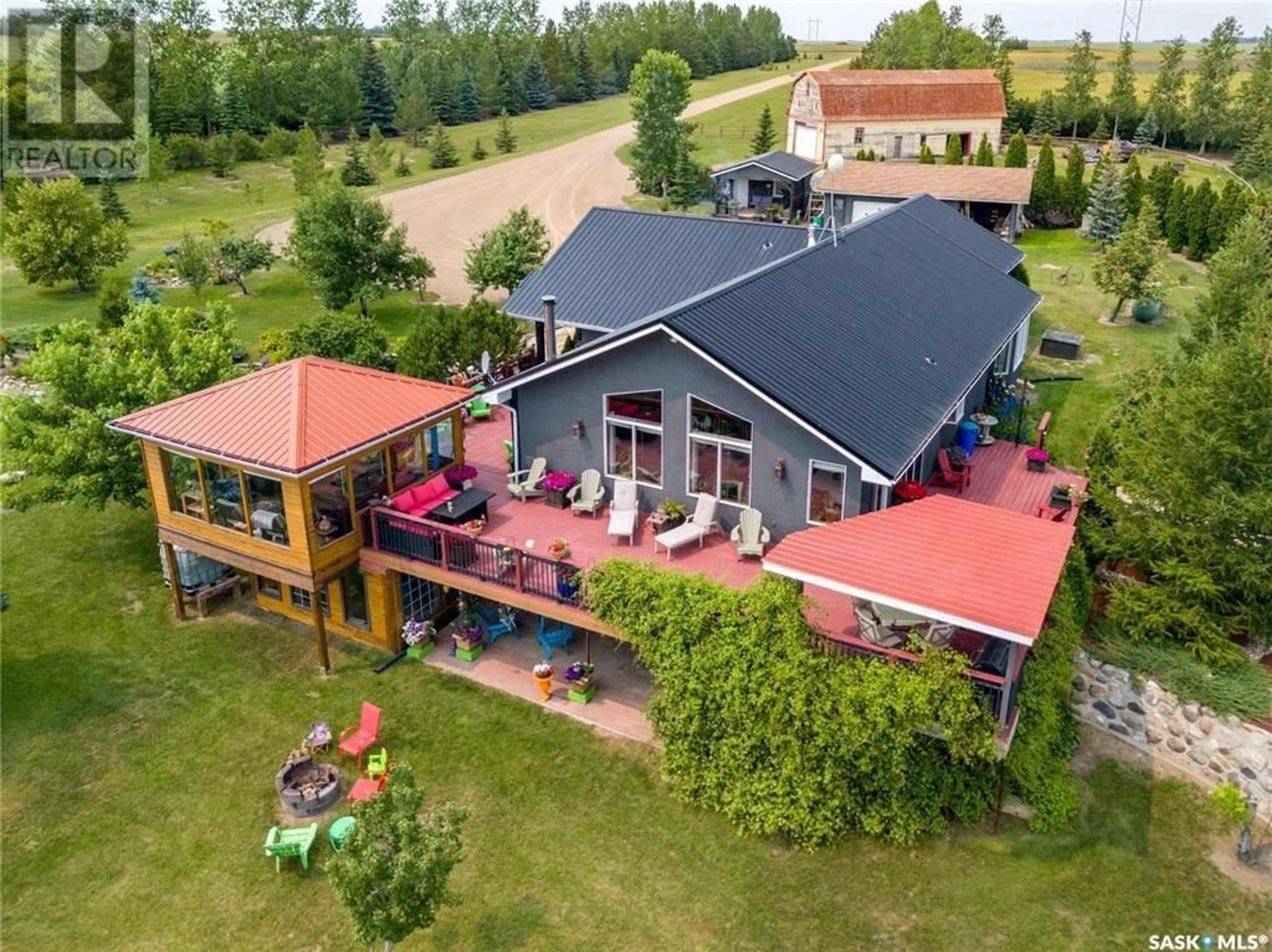 A pic from outside/outdoor area/front of a property/back of a property/a pic from drone, building for TAYLOR ACREAGE, Pense Rm No. 160 Saskatchewan S0G3W0