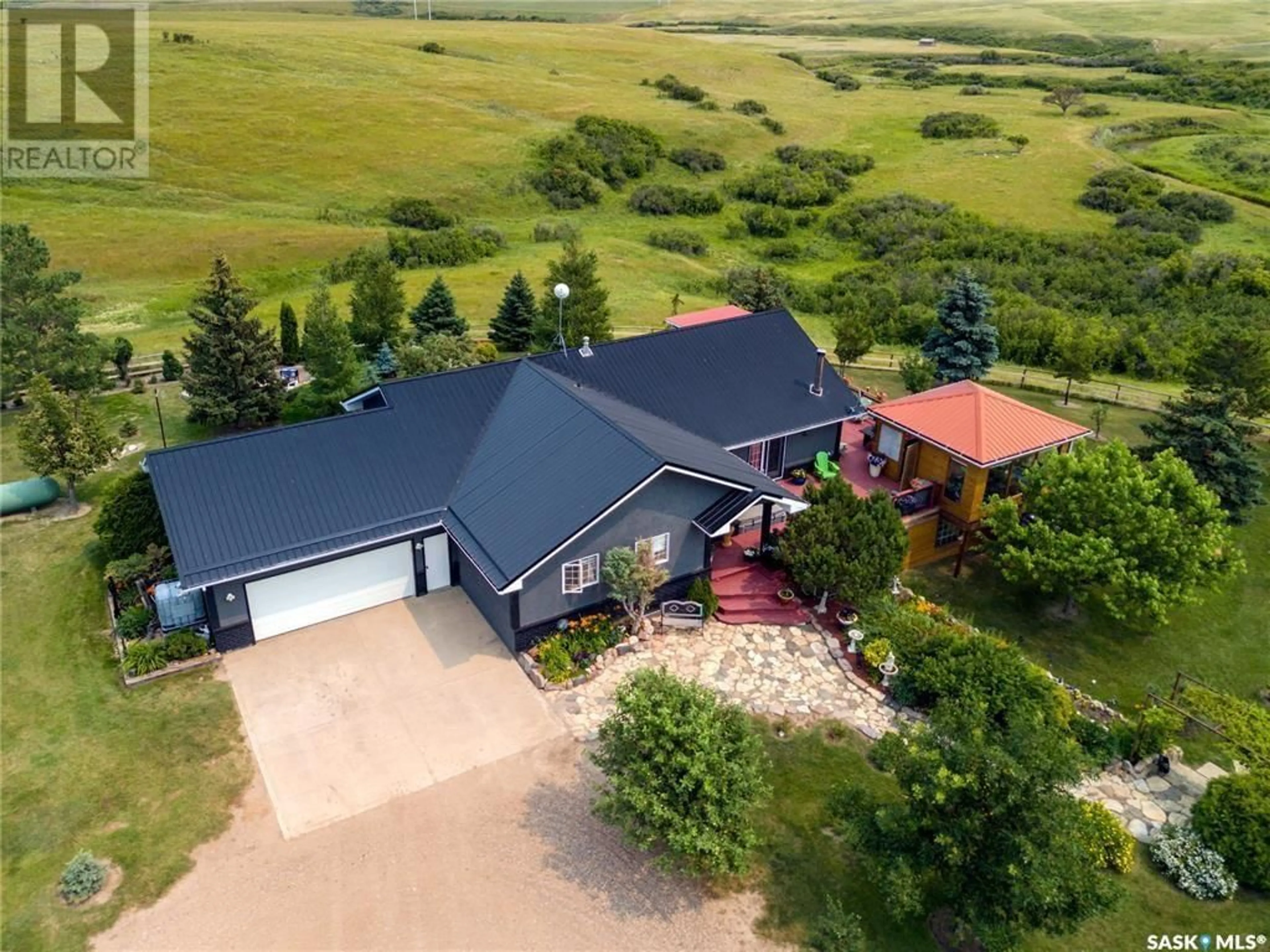 A pic from outside/outdoor area/front of a property/back of a property/a pic from drone, unknown for TAYLOR ACREAGE, Pense Rm No. 160 Saskatchewan S0G3W0