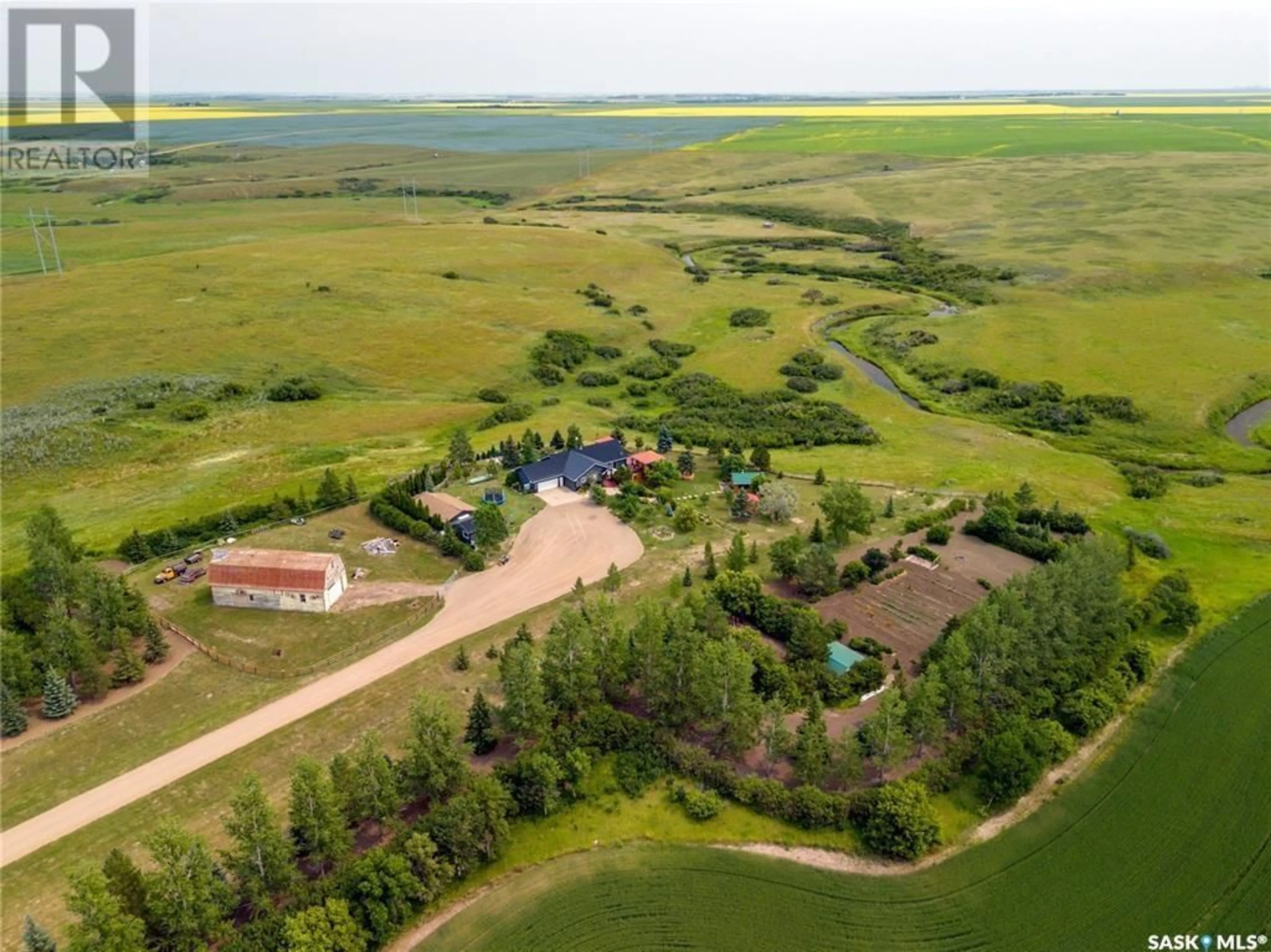 A pic from outside/outdoor area/front of a property/back of a property/a pic from drone, unknown for TAYLOR ACREAGE, Pense Rm No. 160 Saskatchewan S0G3W0