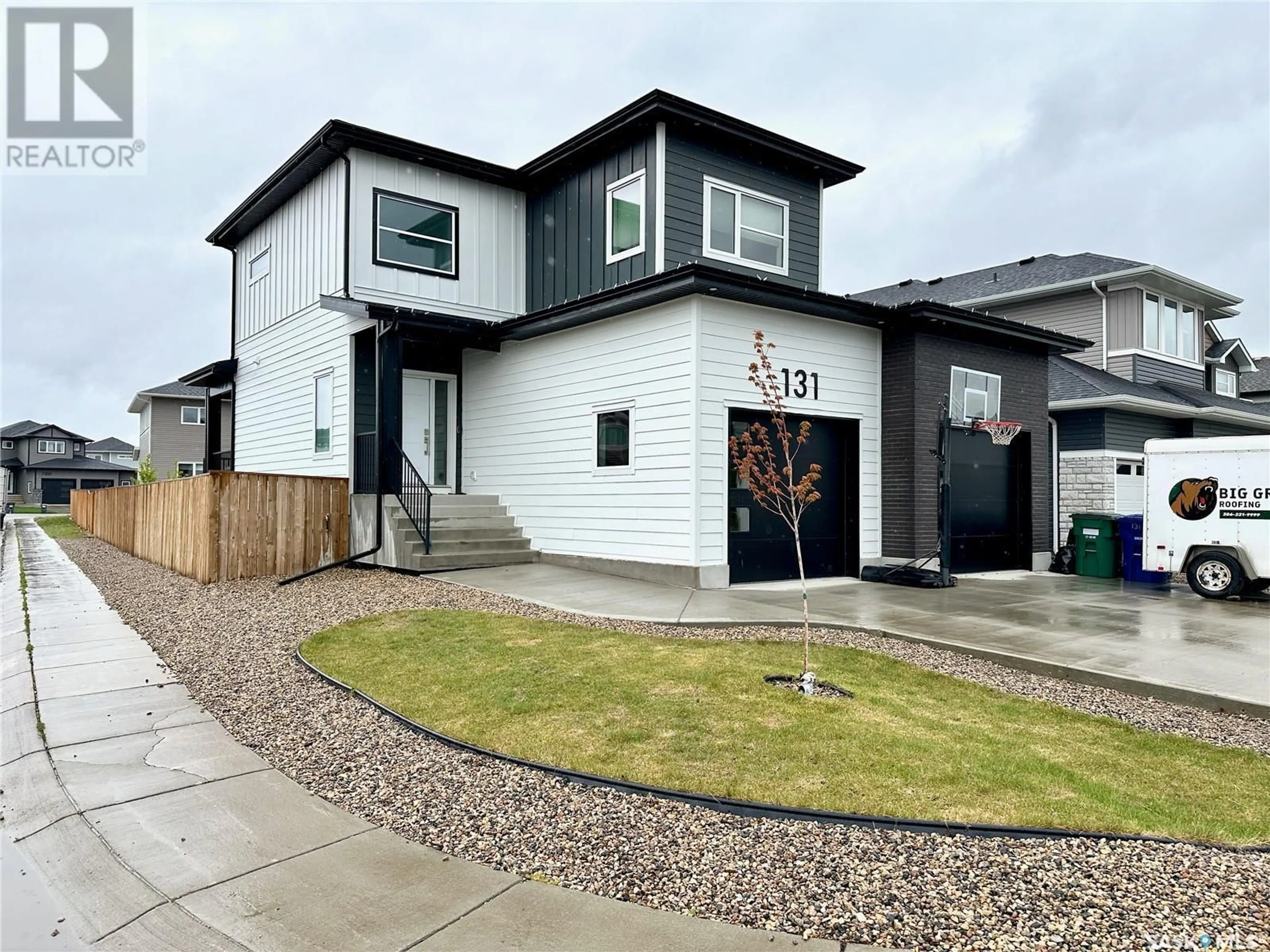 Home with vinyl exterior material, street for 131 KENASCHUK CRESCENT, Saskatoon Saskatchewan S7W0Y3