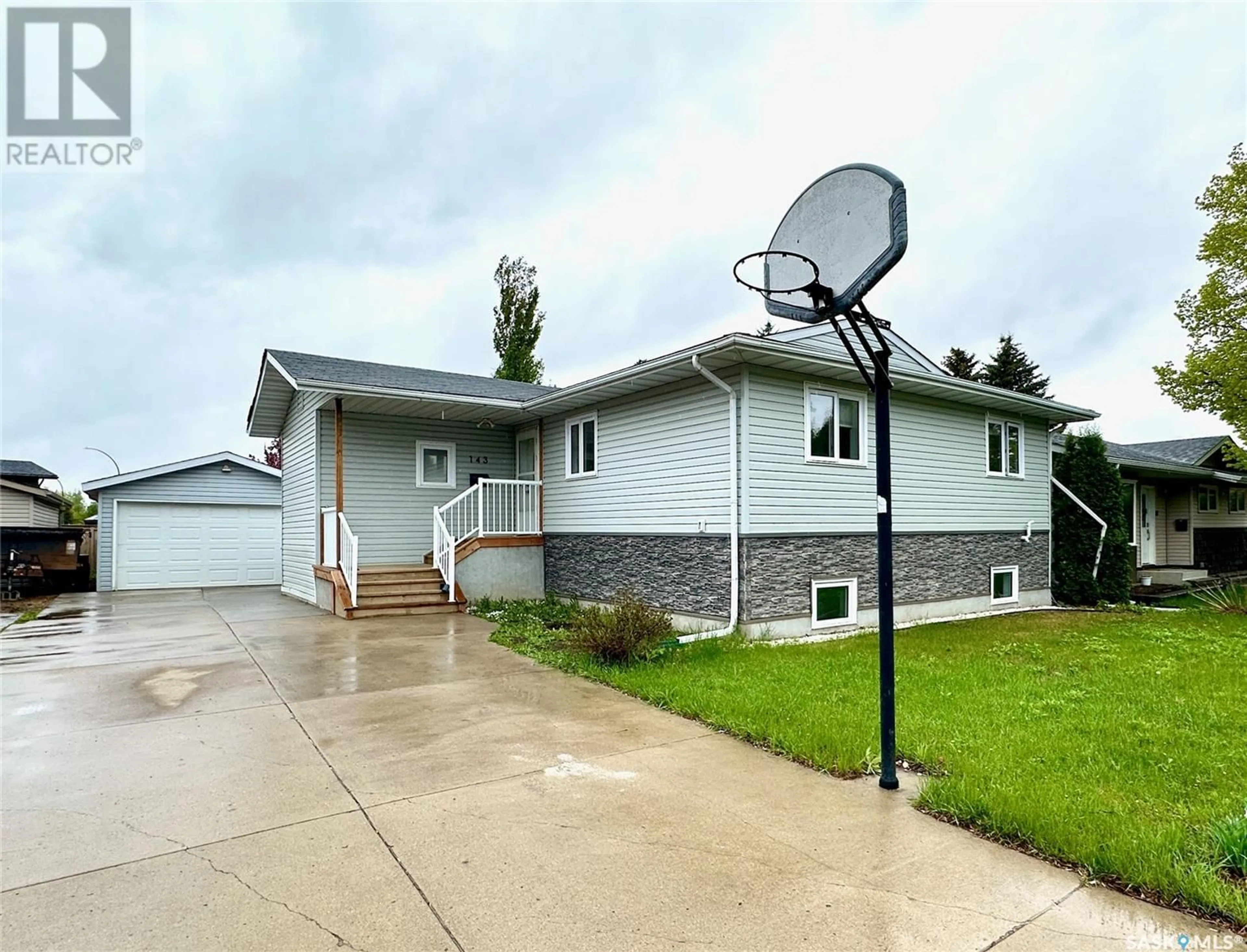 Home with vinyl exterior material, street for 143 GIRGULIS CRESCENT, Saskatoon Saskatchewan S7K6W8