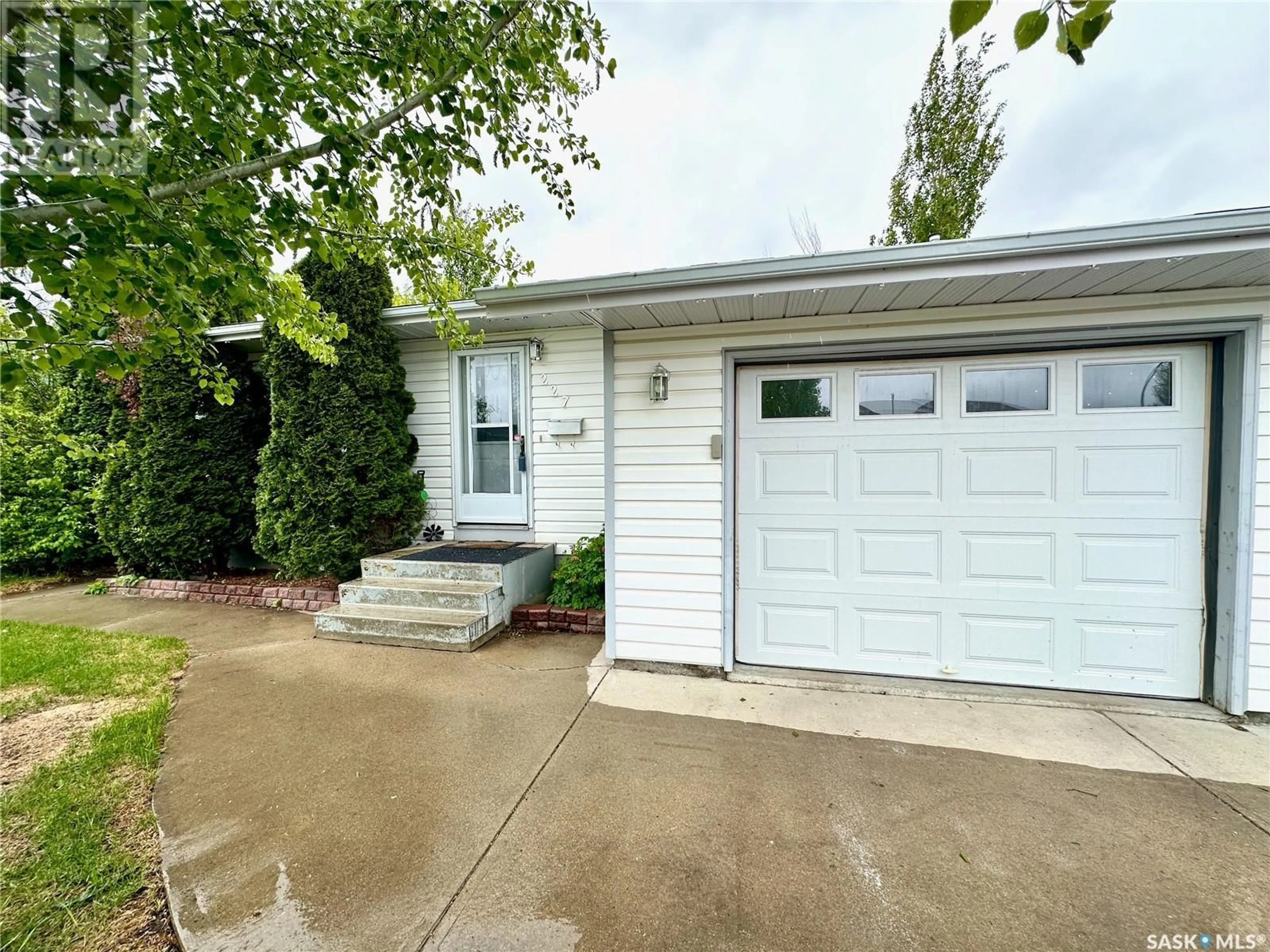 Home with vinyl exterior material, street for 227 BOWMAN COURT, Saskatoon Saskatchewan S7L6P6