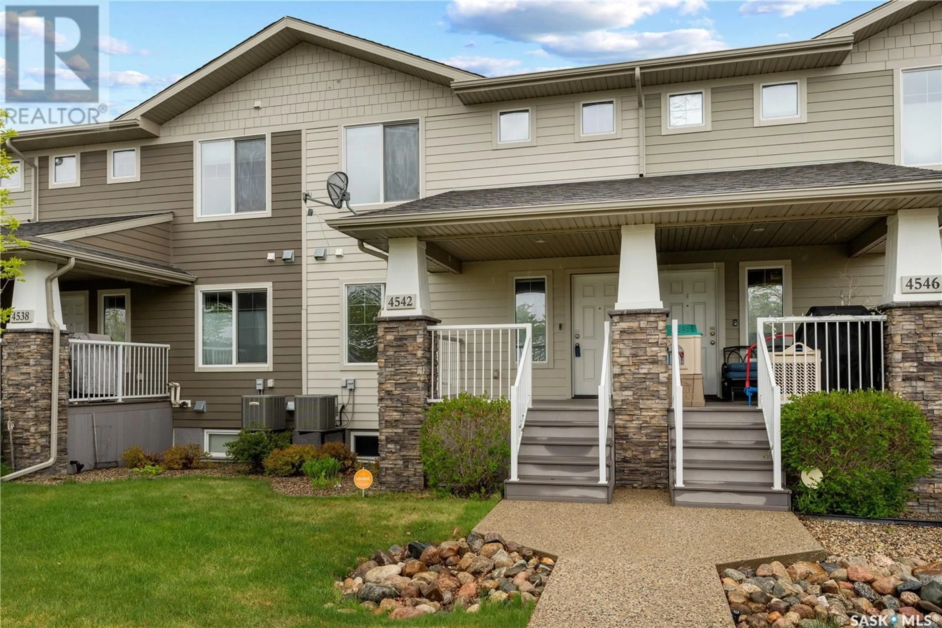Home with vinyl exterior material, street for 4542 HARBOUR LANDING DRIVE, Regina Saskatchewan S4W0C1