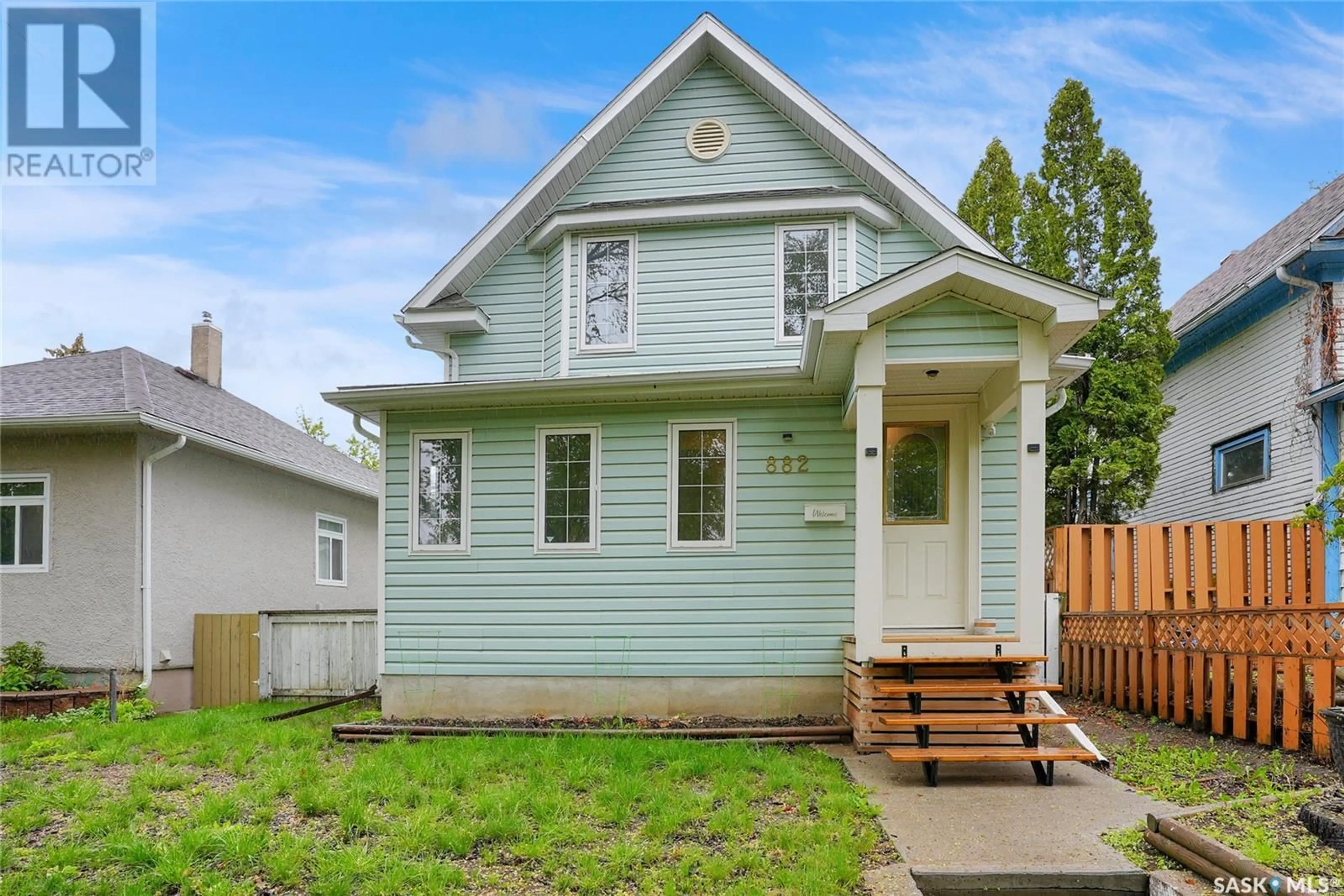 Home with vinyl exterior material, street for 882 CONNAUGHT AVENUE, Moose Jaw Saskatchewan S6H4B3