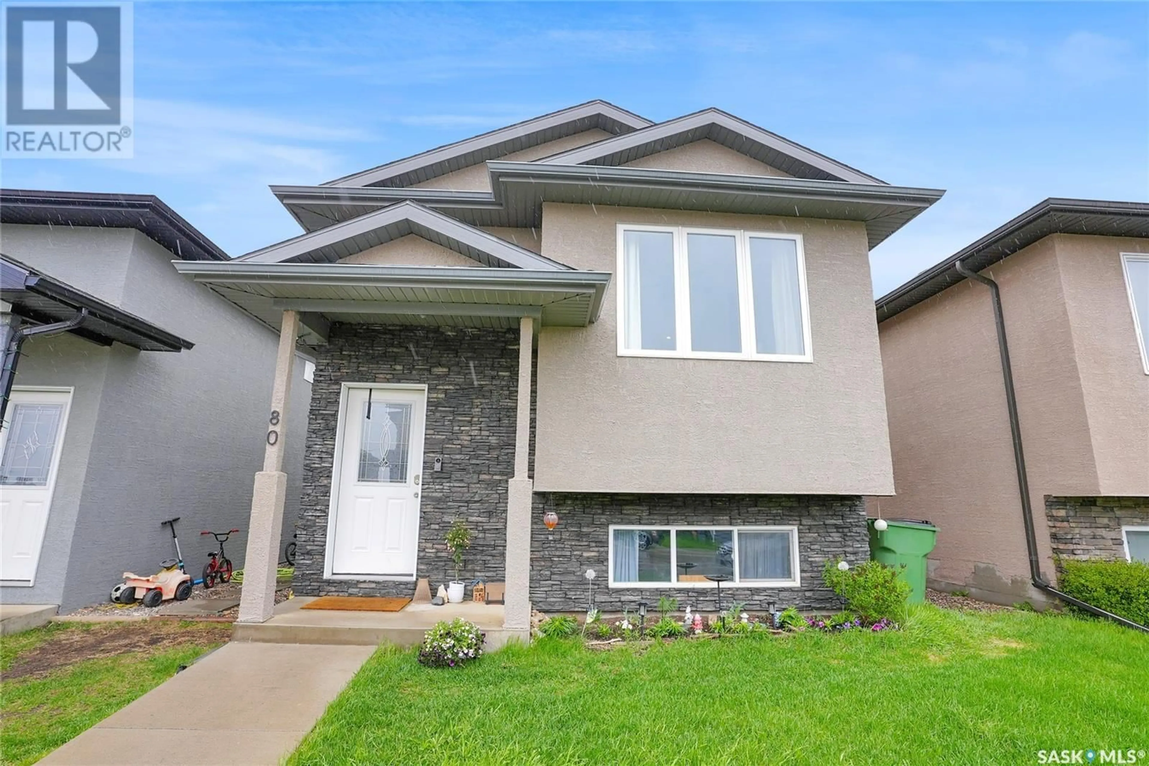Home with vinyl exterior material, street for 80 BRIGHAM ROAD, Moose Jaw Saskatchewan S6K0A7