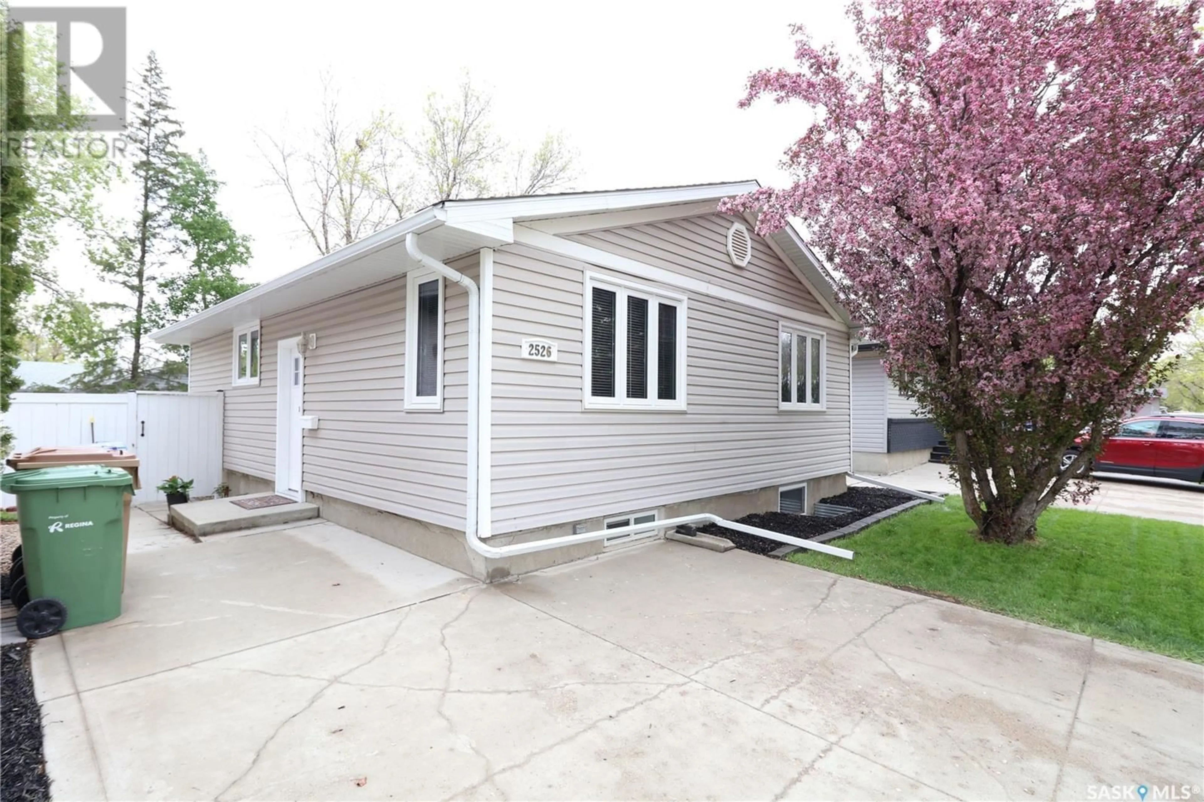 Home with vinyl exterior material, street for 2526 DEWDNEY AVENUE, Regina Saskatchewan S4N4V5