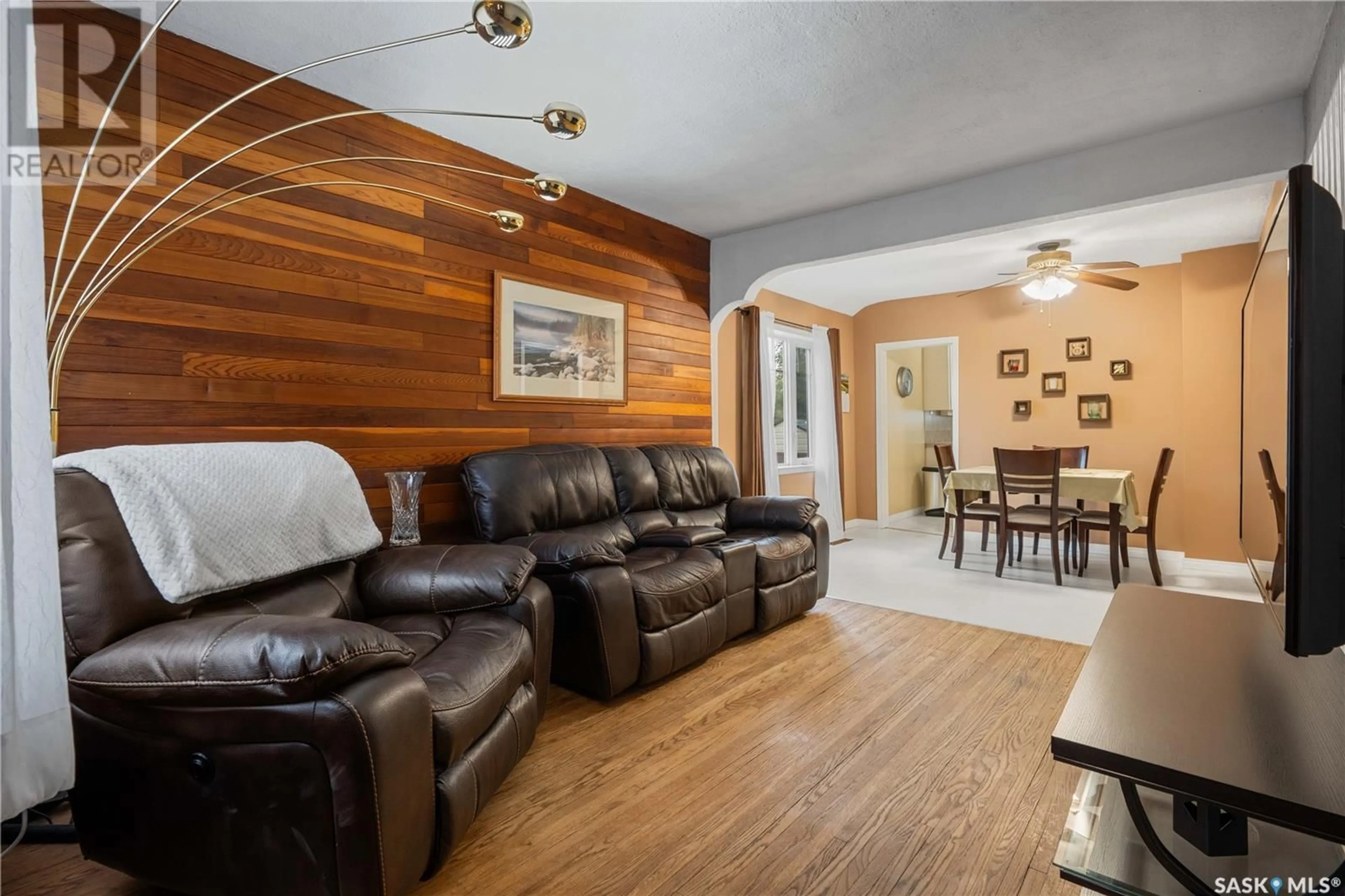 Living room with furniture, wood/laminate floor for 1376 ATHOL STREET, Regina Saskatchewan S4T3C5