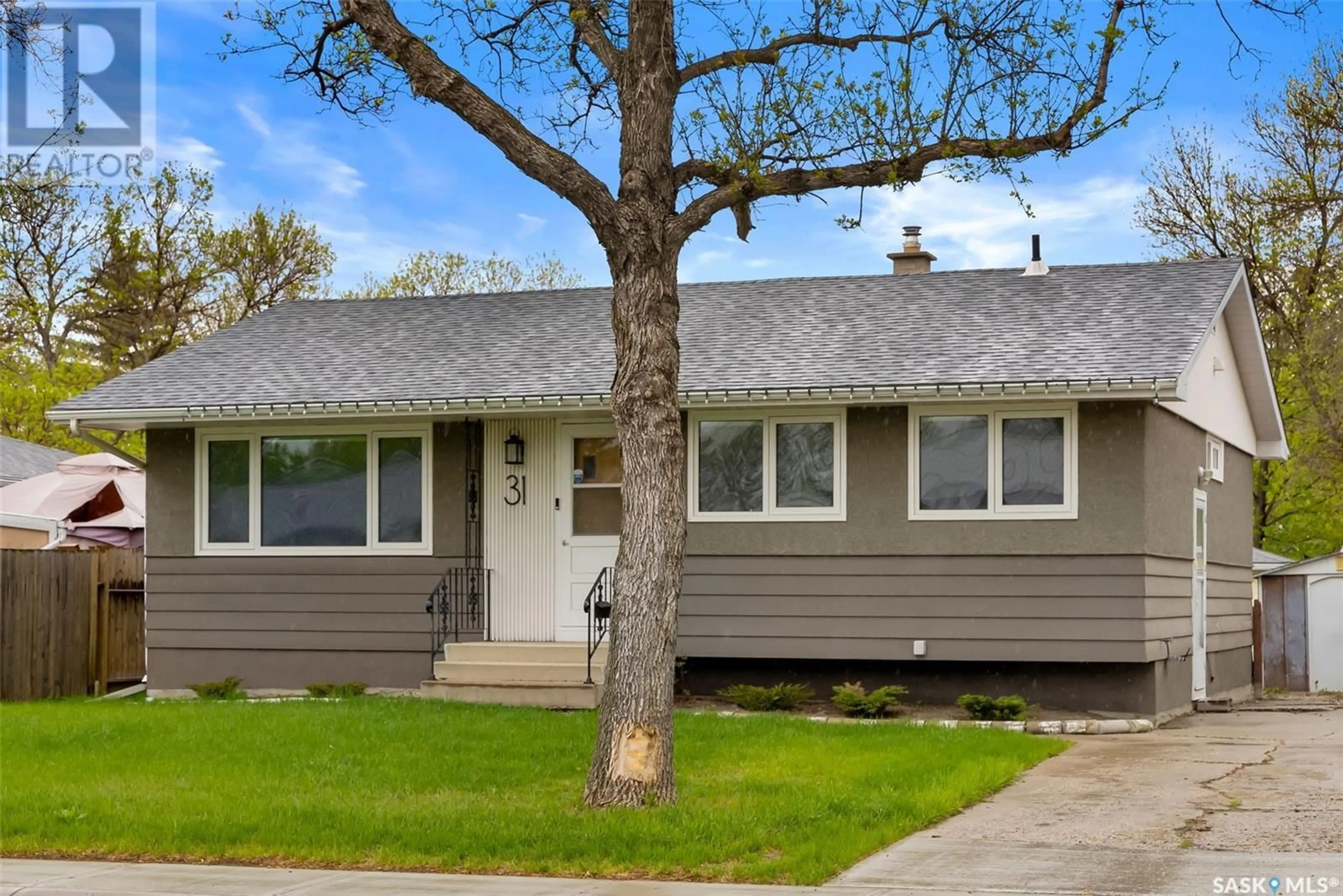 Home with vinyl exterior material, street for 31 CANNON STREET, Regina Saskatchewan S4N1L7