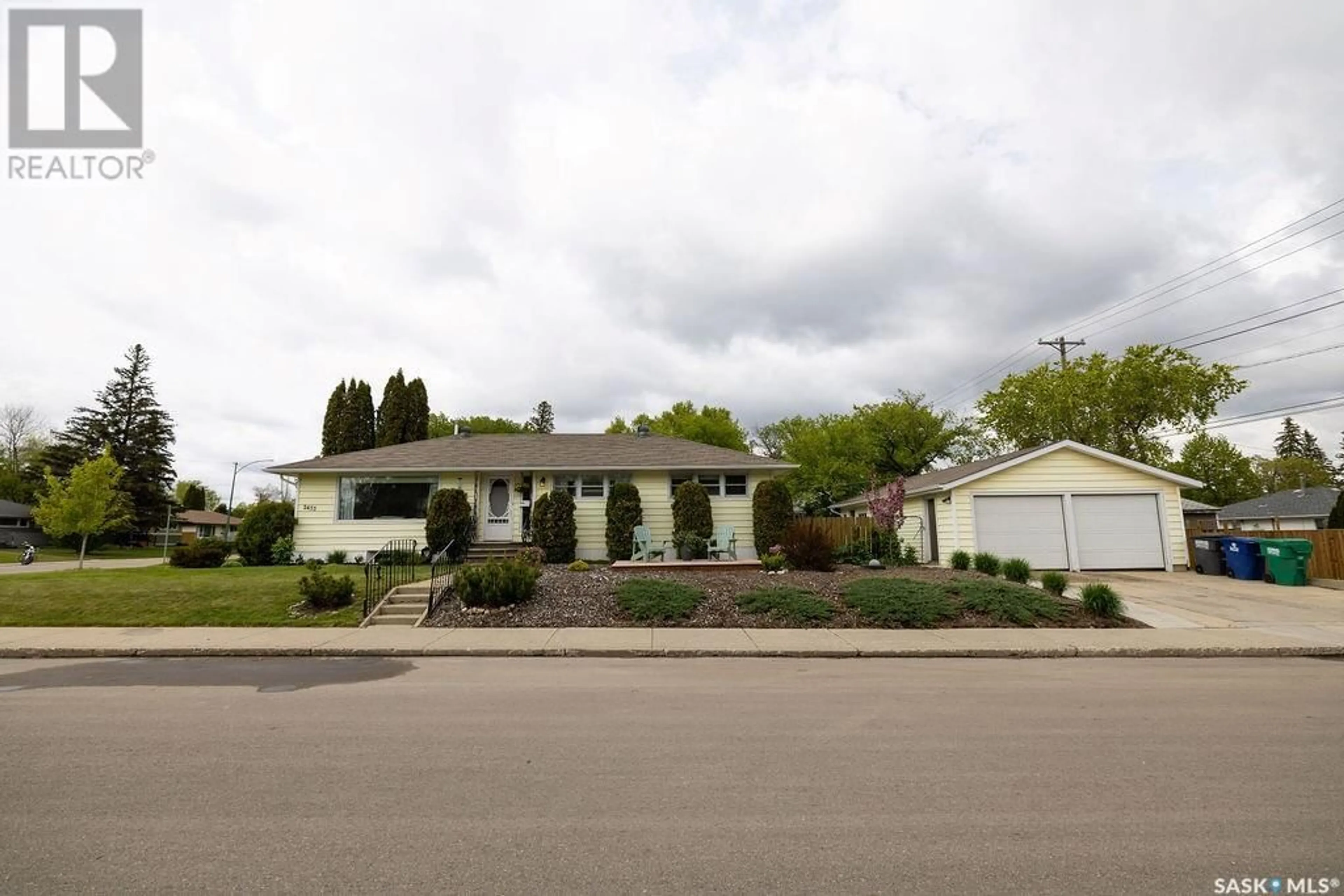 Home with vinyl exterior material, street for 2433 BROADWAY AVENUE, Saskatoon Saskatchewan S7J0Z1