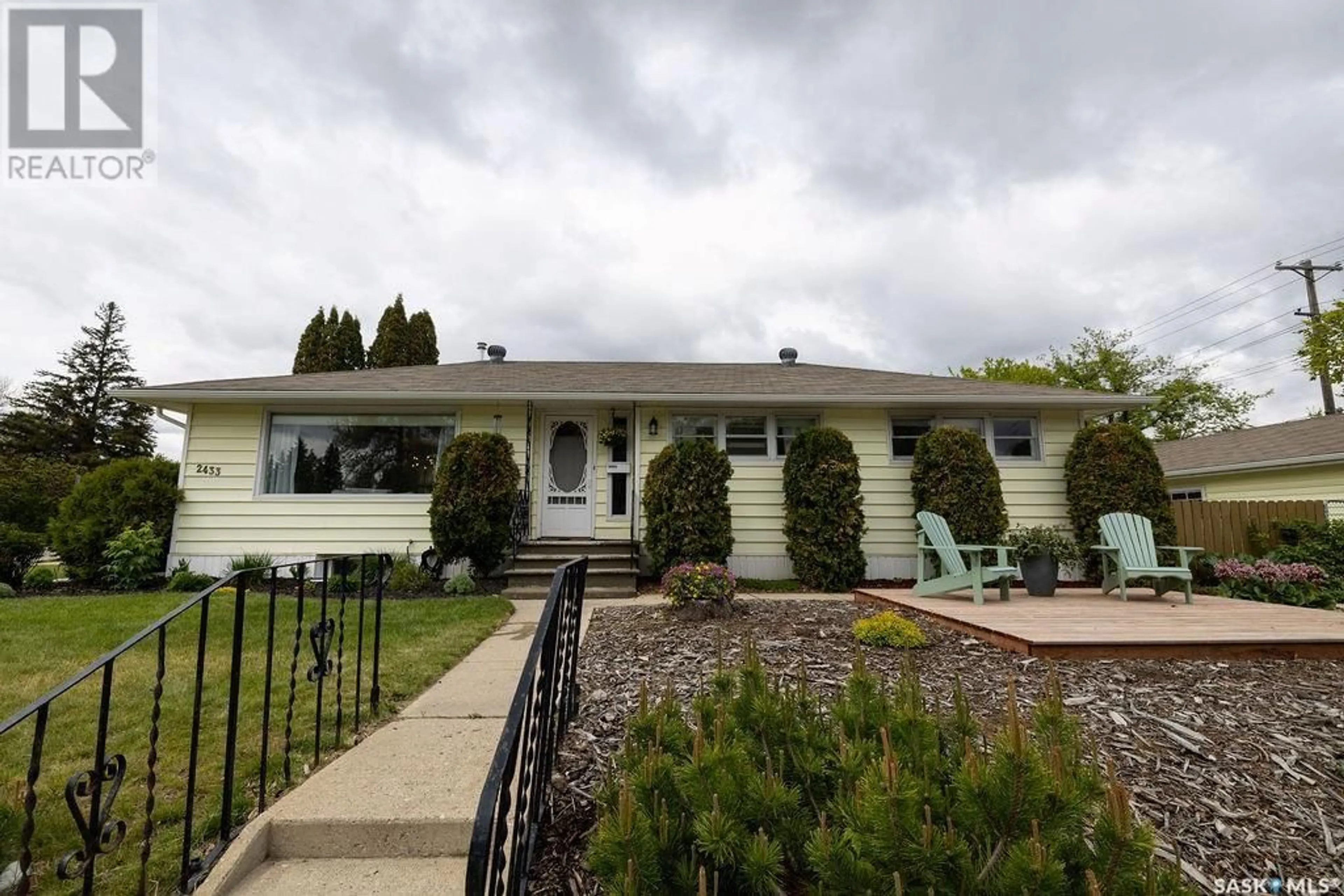 Home with vinyl exterior material, street for 2433 BROADWAY AVENUE, Saskatoon Saskatchewan S7J0Z1
