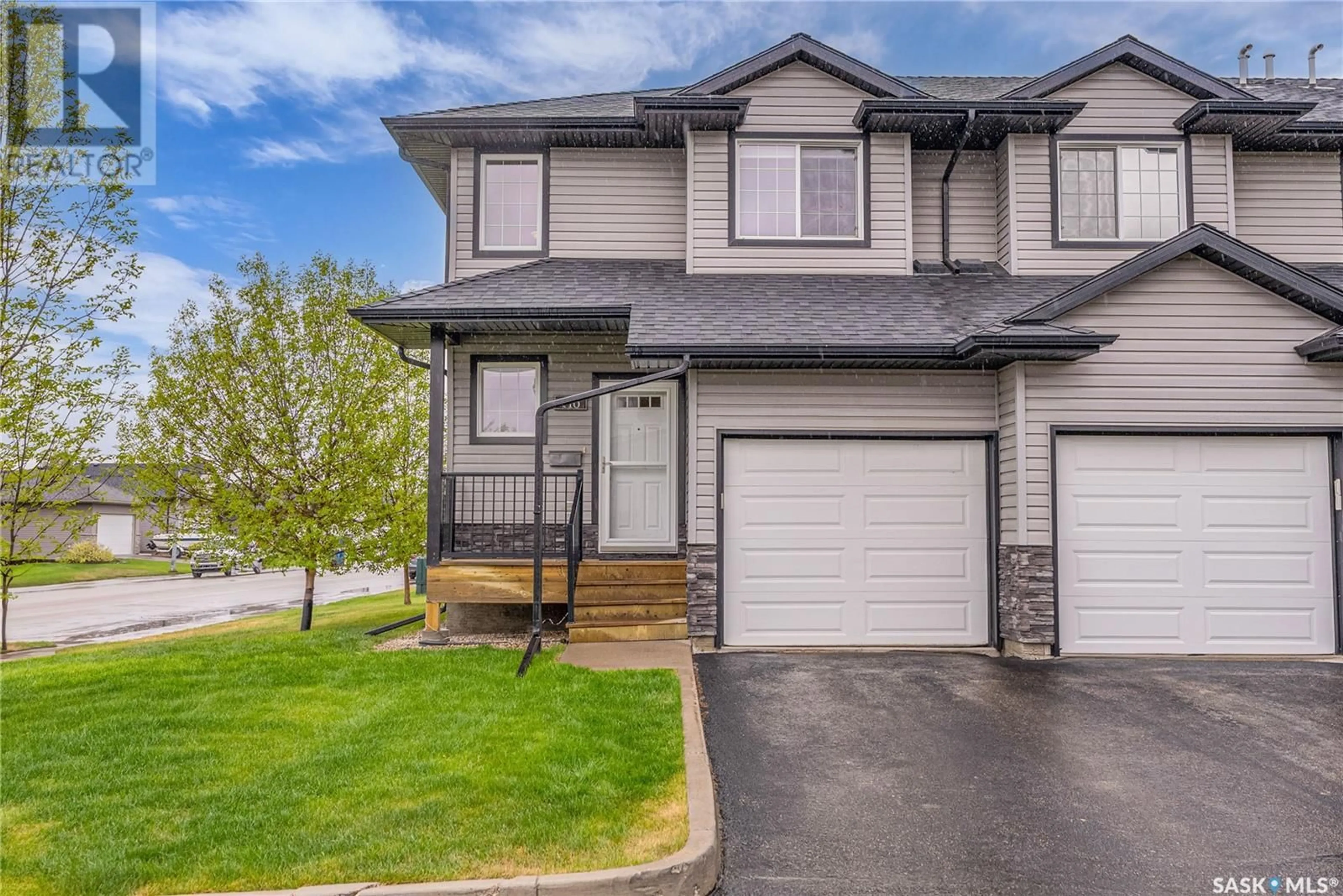 Home with vinyl exterior material, street for 901 - 116 4TH STREET, Martensville Saskatchewan S0K2T1