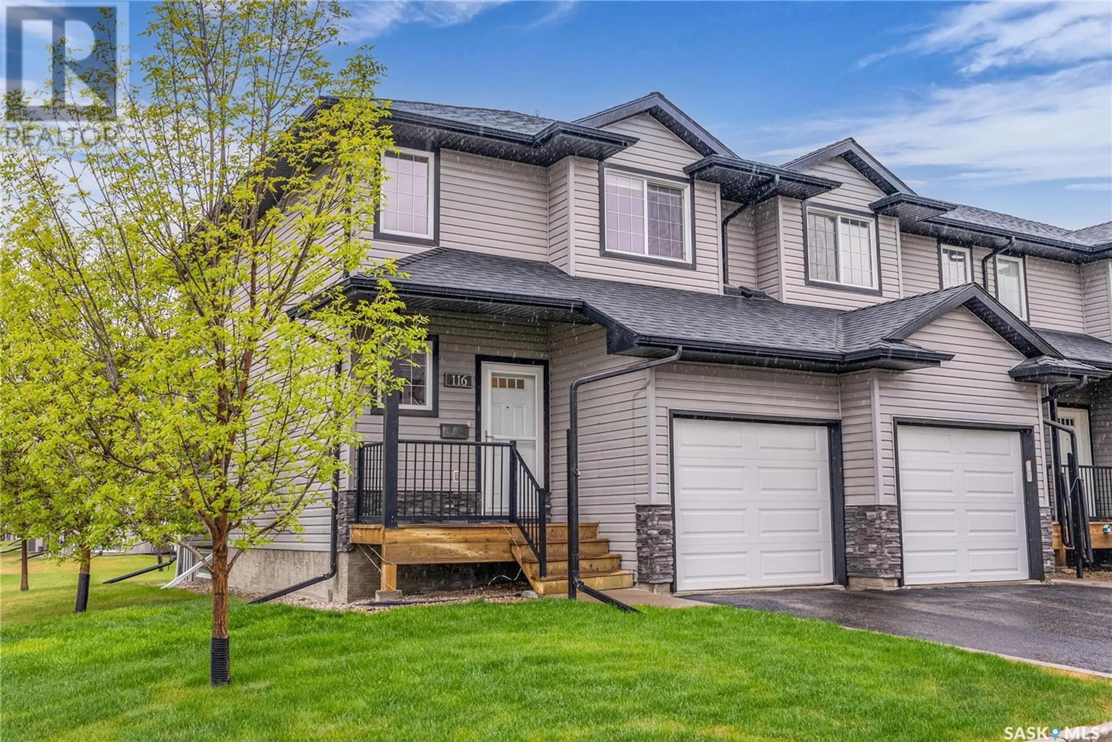 Home with vinyl exterior material, street for 901 - 116 4TH STREET, Martensville Saskatchewan S0K2T1