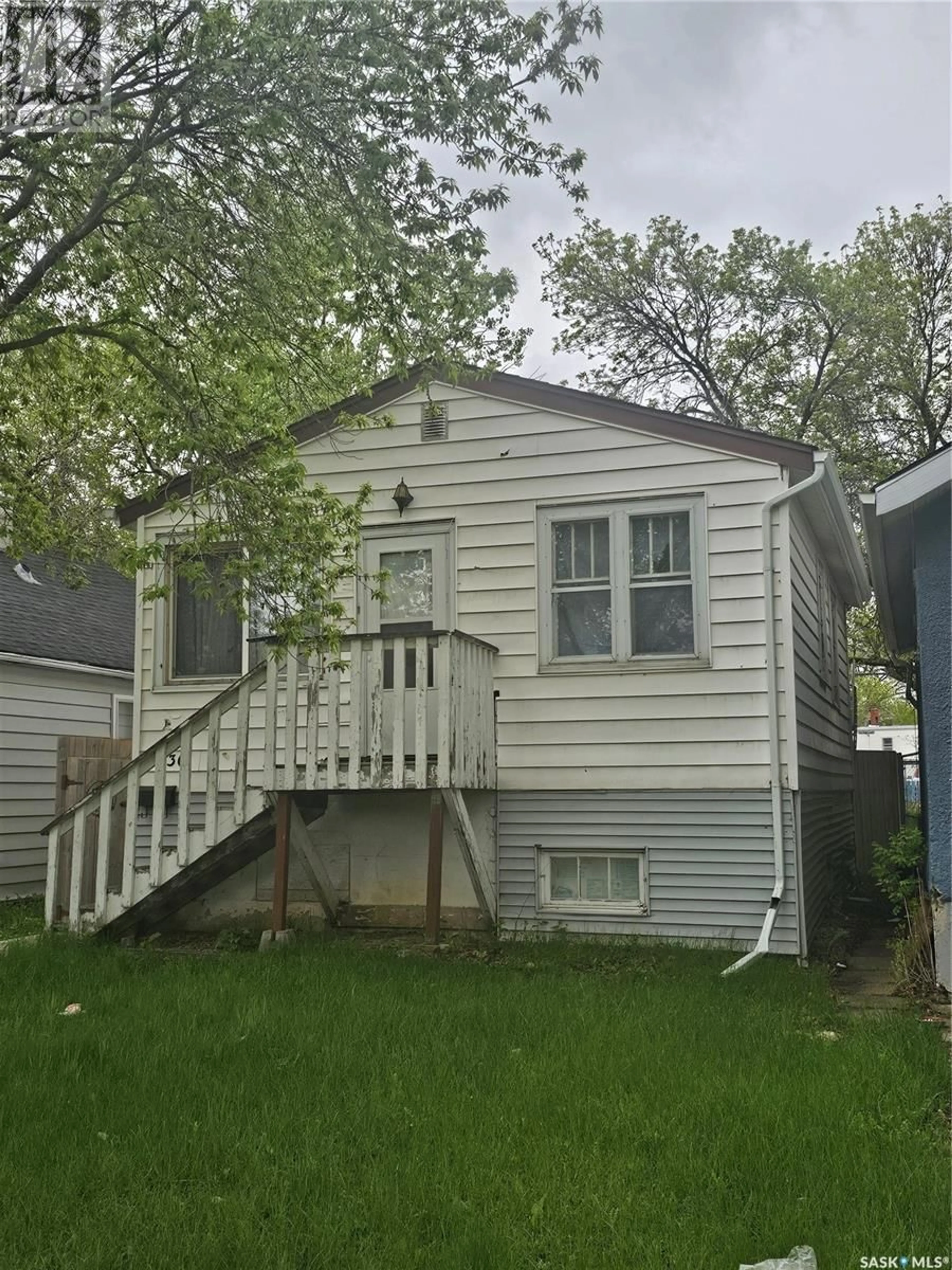 Home with vinyl exterior material, street for 1036 ATHOL STREET, Regina Saskatchewan S4P2V6