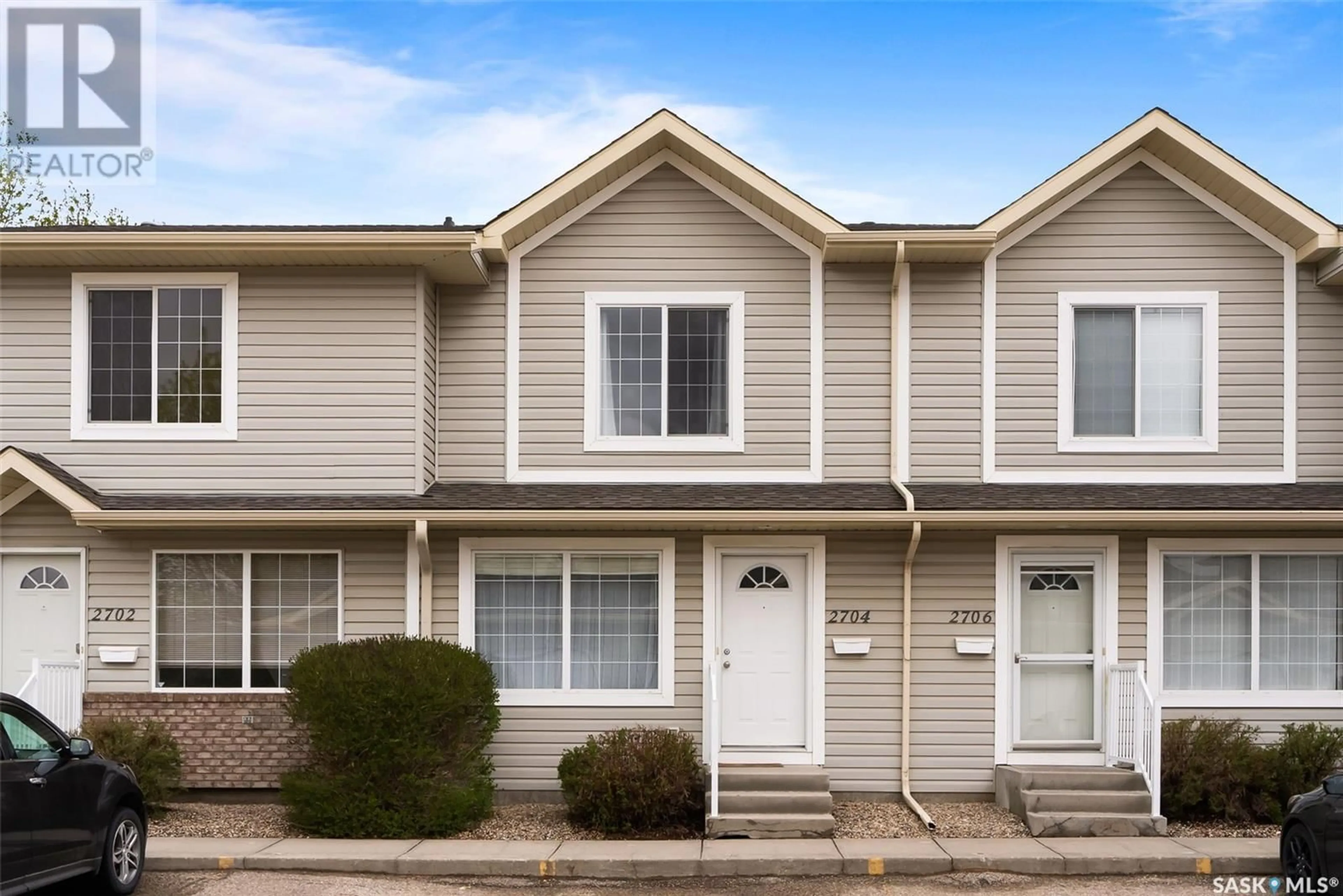 Home with vinyl exterior material, street for 2704 CRANBOURN CRESCENT, Regina Saskatchewan S4V3C1