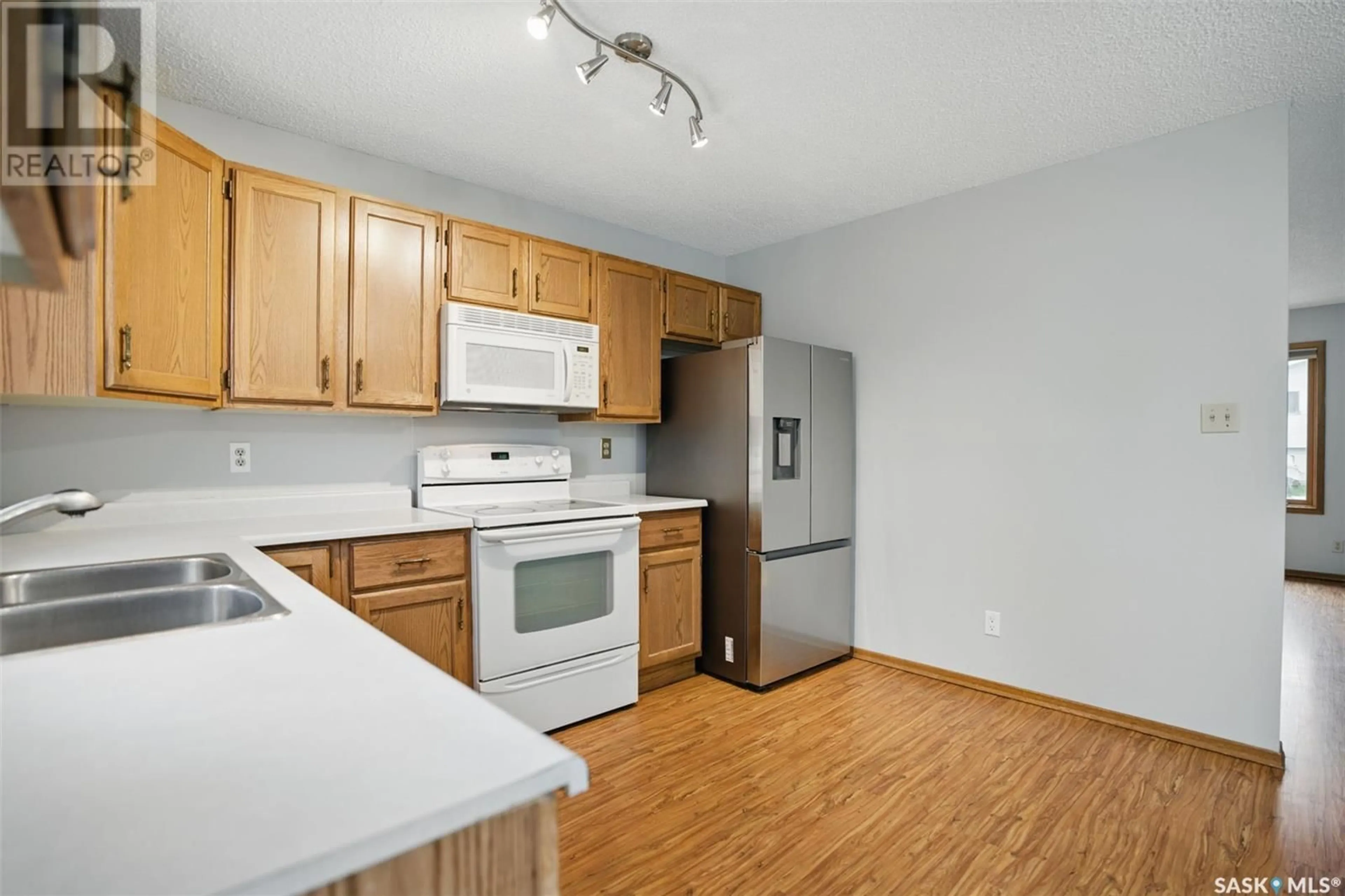 Standard kitchen, wood/laminate floor for 707 WHELAN WAY, Saskatoon Saskatchewan S7L7E6