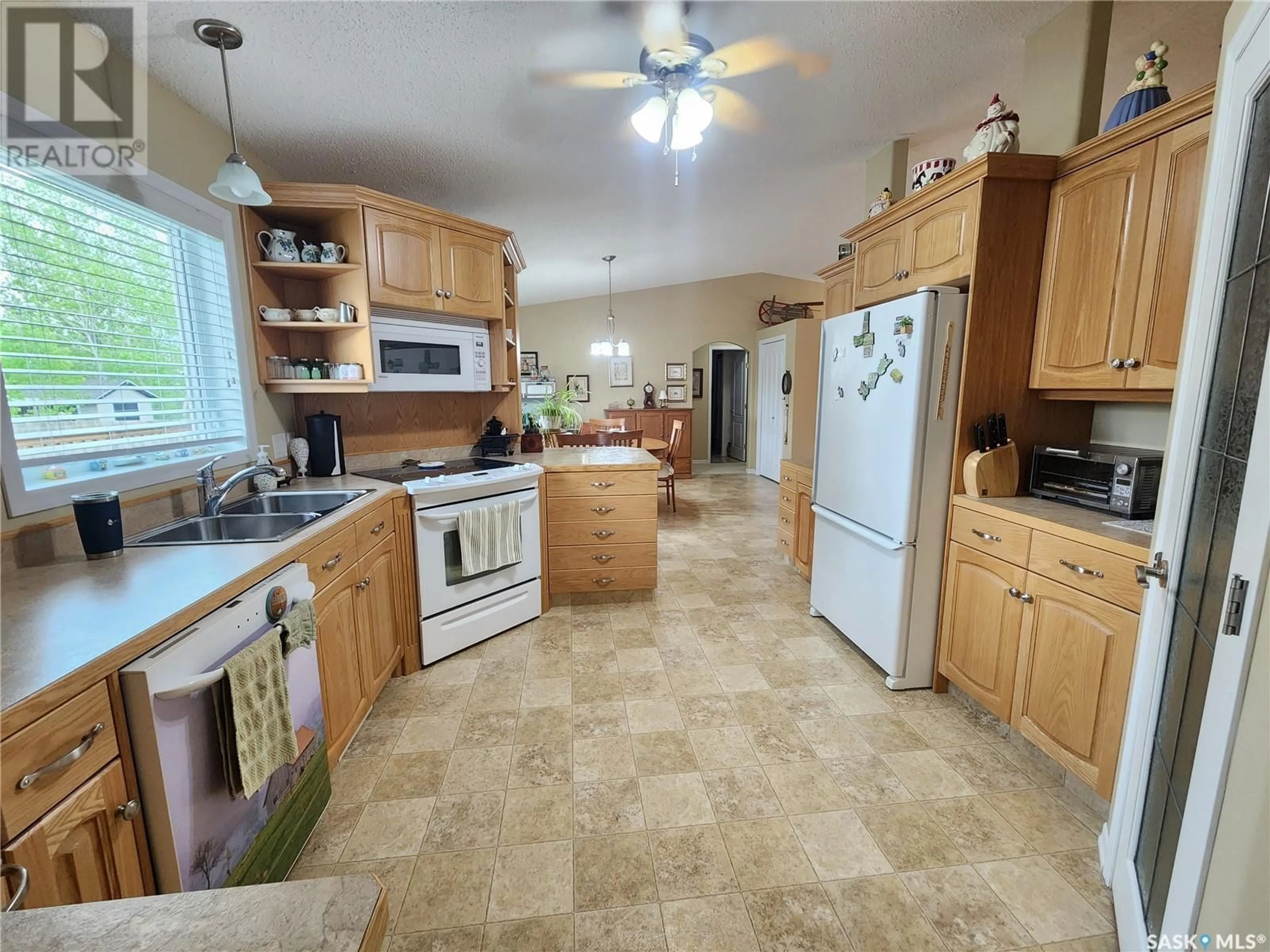 Standard kitchen, ceramic/tile floor for 225 3RD STREET, Weyburn Rm No. 67 Saskatchewan S0C1X0