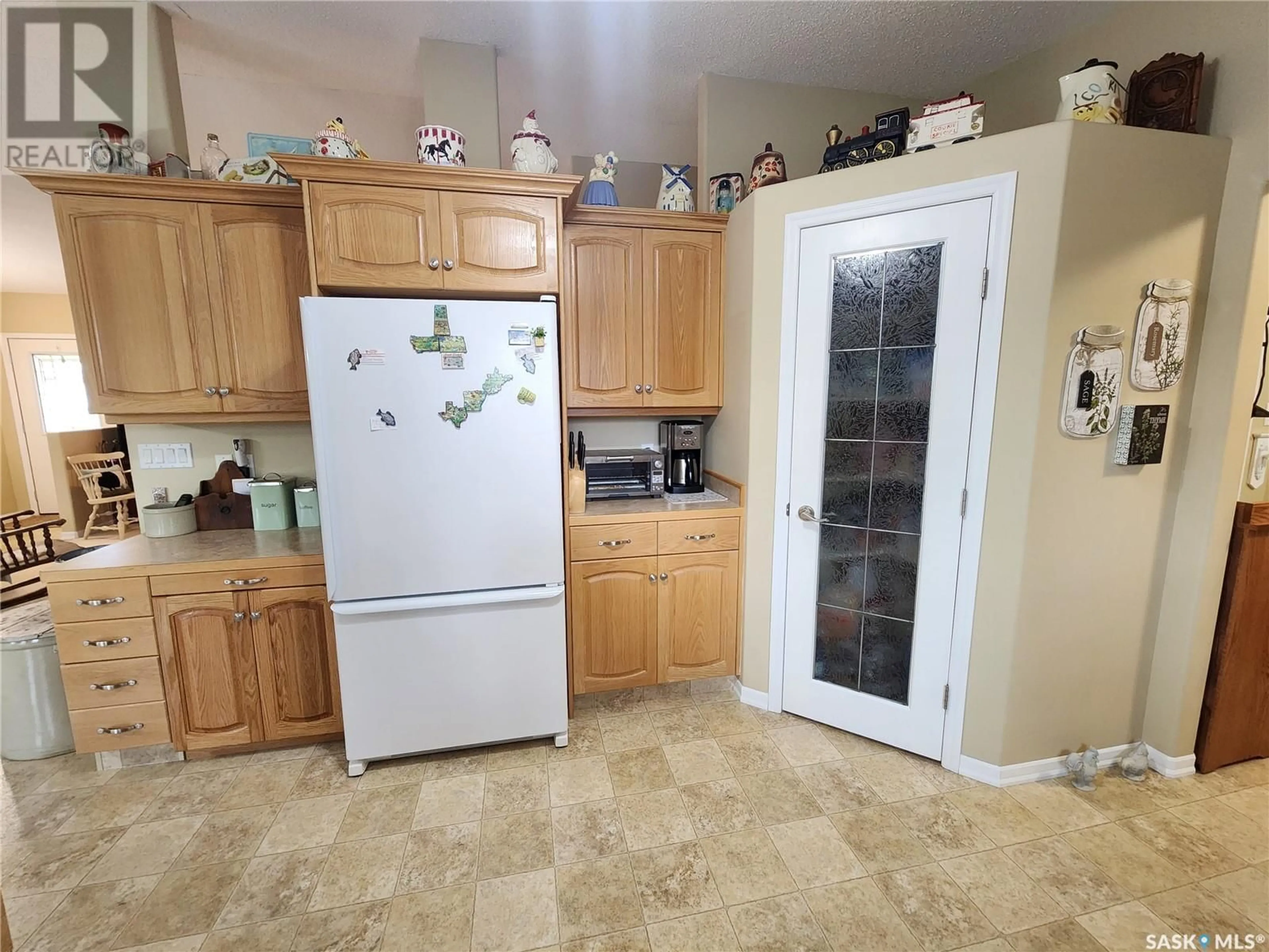 Standard kitchen, ceramic/tile floor for 225 3RD STREET, Weyburn Rm No. 67 Saskatchewan S0C1X0