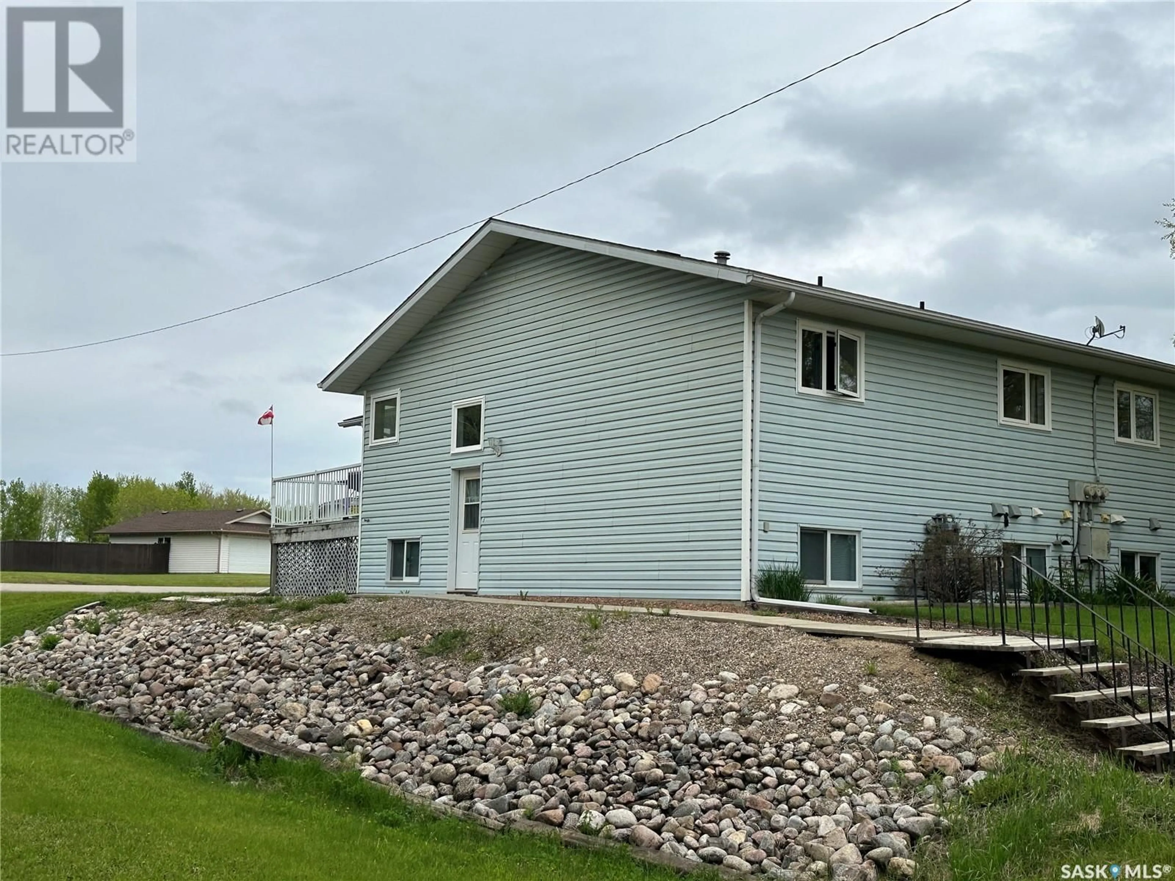A pic from outside/outdoor area/front of a property/back of a property/a pic from drone, building for 228 6TH AVENUE, Big River Saskatchewan S0J0E0