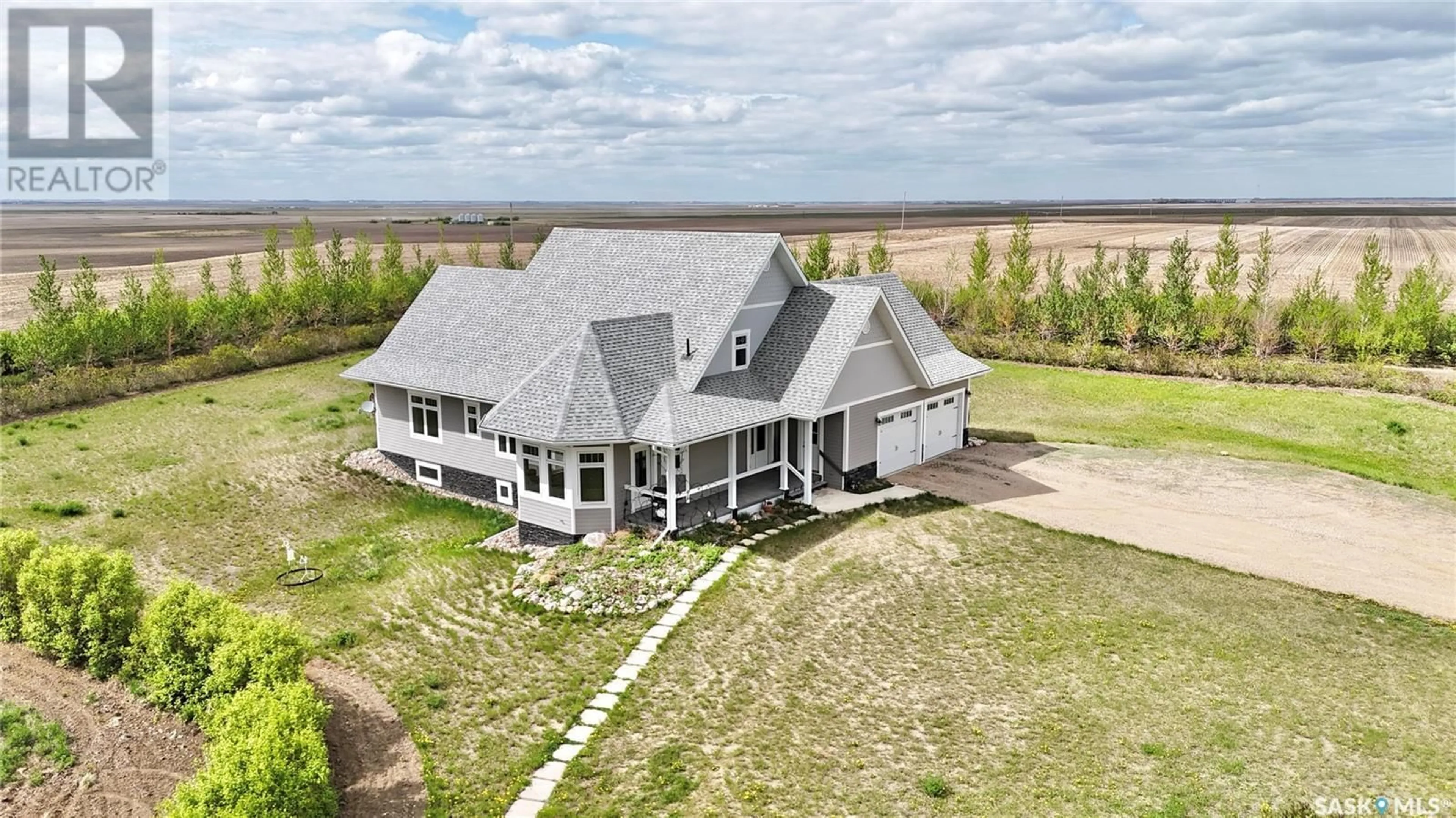 A pic from outside/outdoor area/front of a property/back of a property/a pic from drone, building for 15 OUTLOOK HIGHWAY, Outlook Saskatchewan S0L2N0