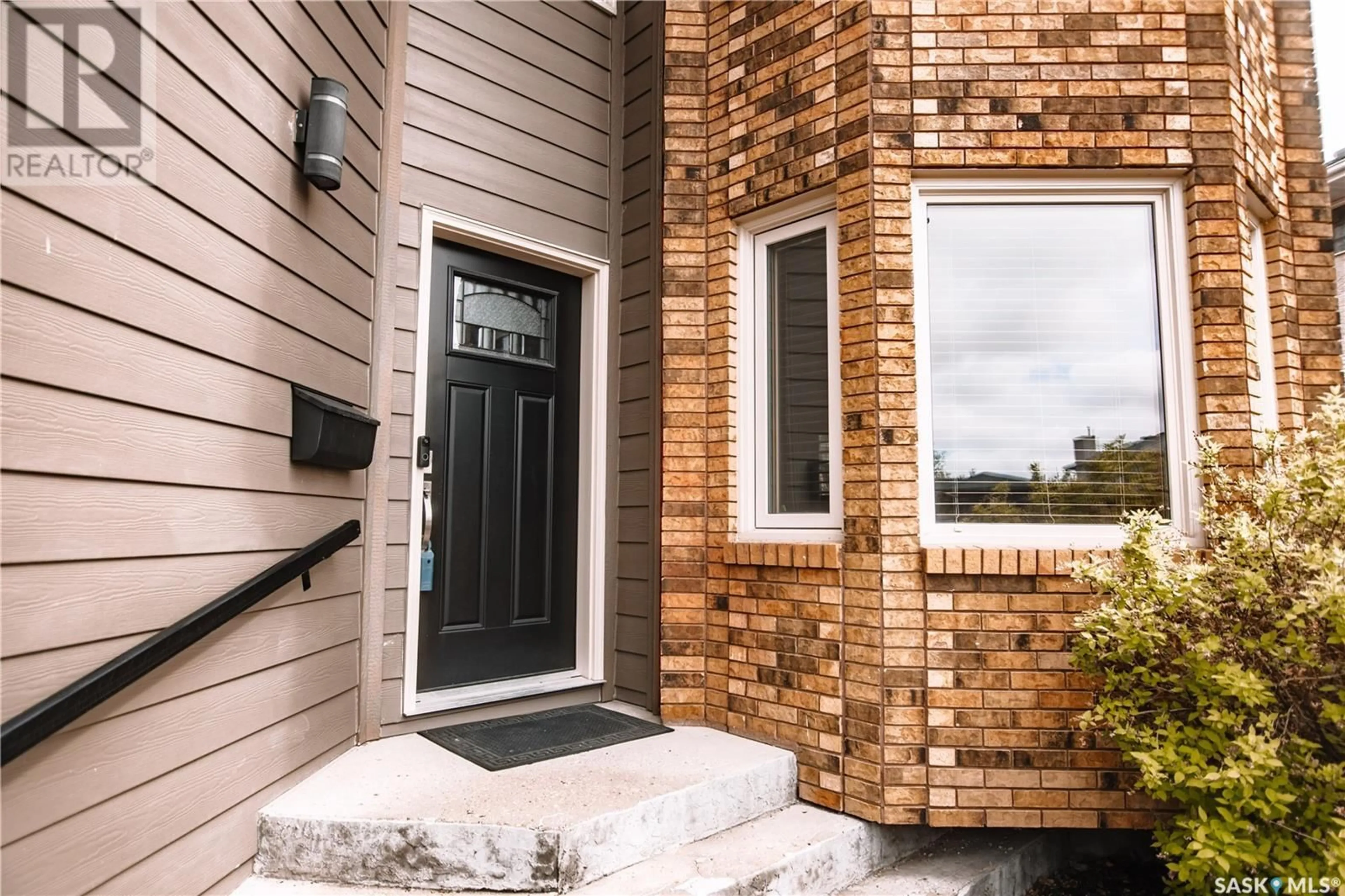 Home with brick exterior material, street for 2022 JANZEN CRESCENT, Regina Saskatchewan S4V2J2