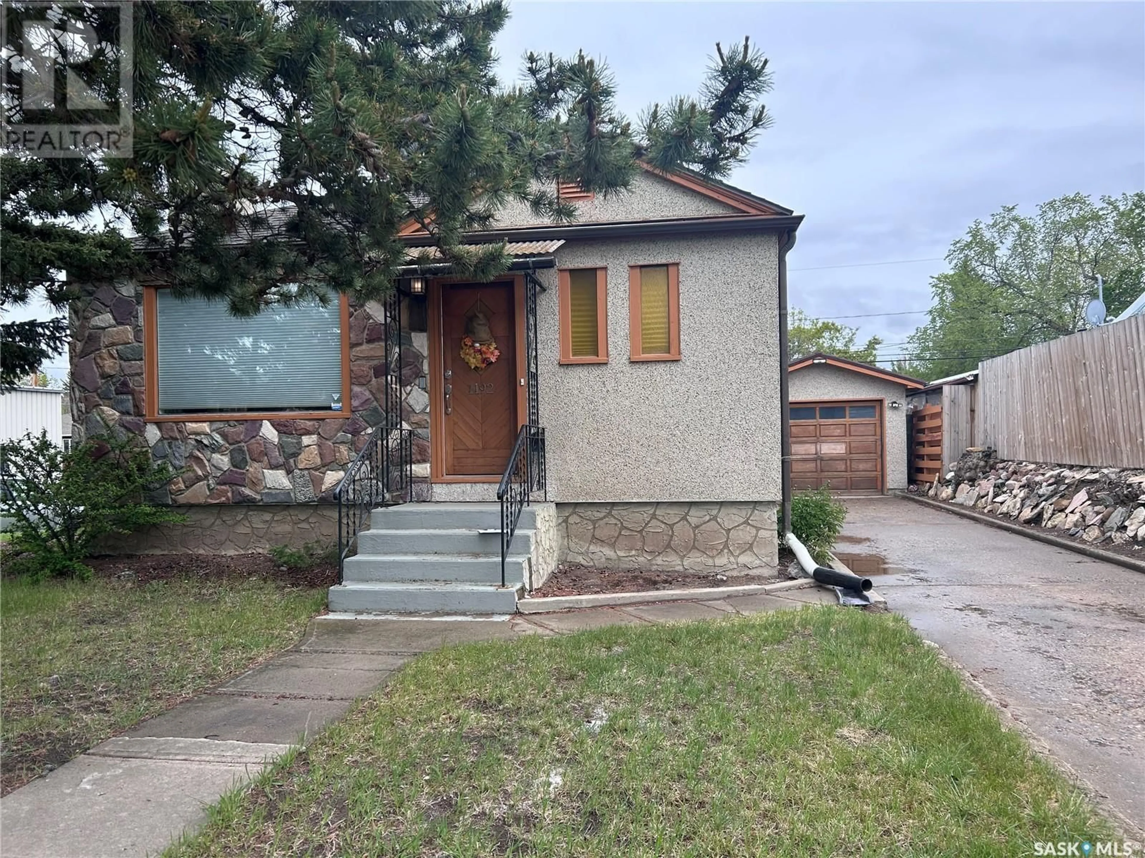 Home with brick exterior material, street for 1192 105TH STREET, North Battleford Saskatchewan S9A1S7