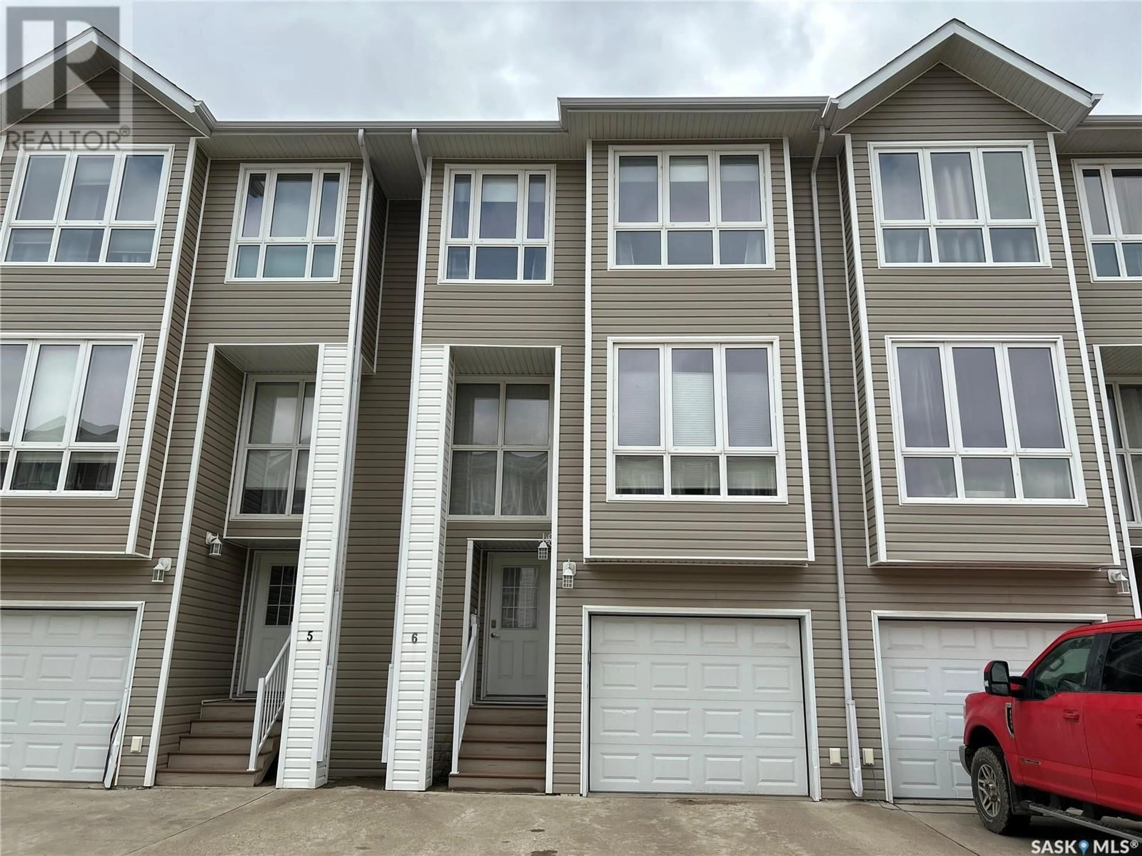 Home with vinyl exterior material, street for 6 - 697 SUN VALLEY DRIVE, Estevan Saskatchewan S4A2X7